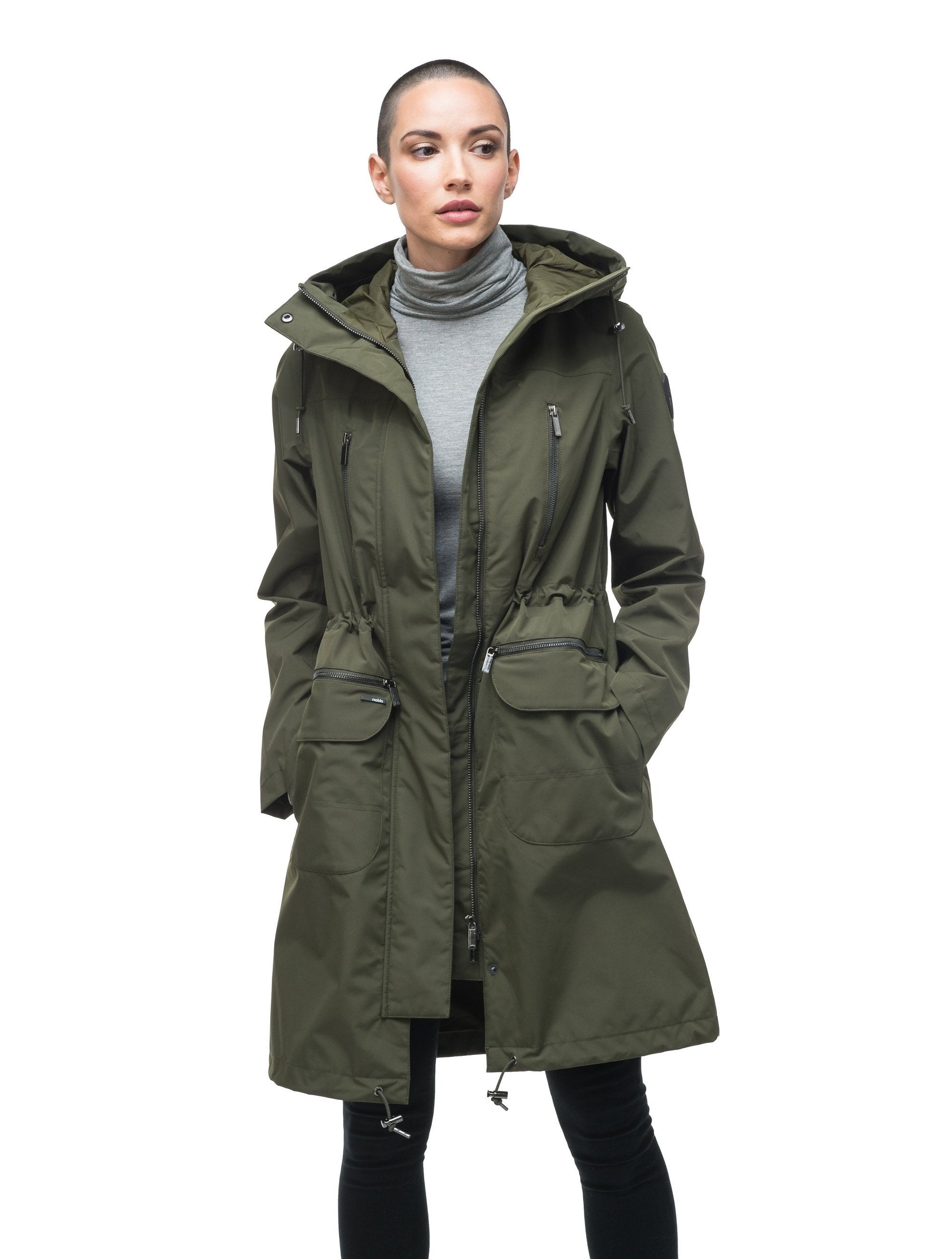 Women's knee length anorak with four front pockets and adjustable cord waist in Fatigue