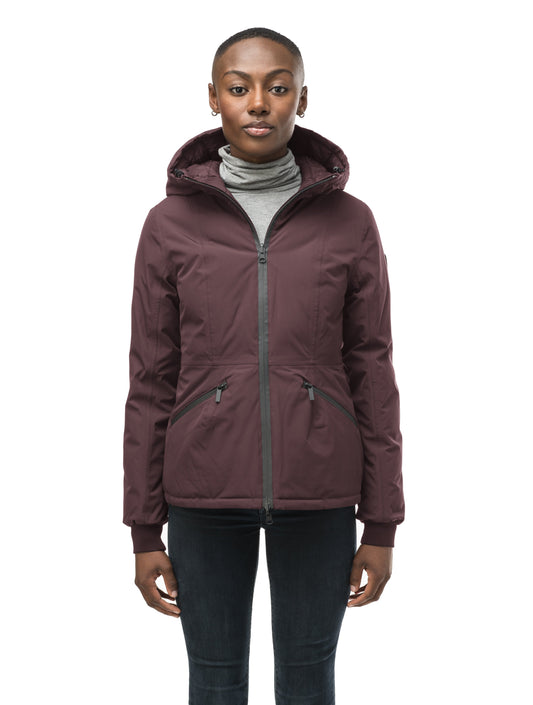 A women's two in one reversible hip length down jacket, one side is quilted and one side is solid waterproof fabric in Burgundy + Burgundy