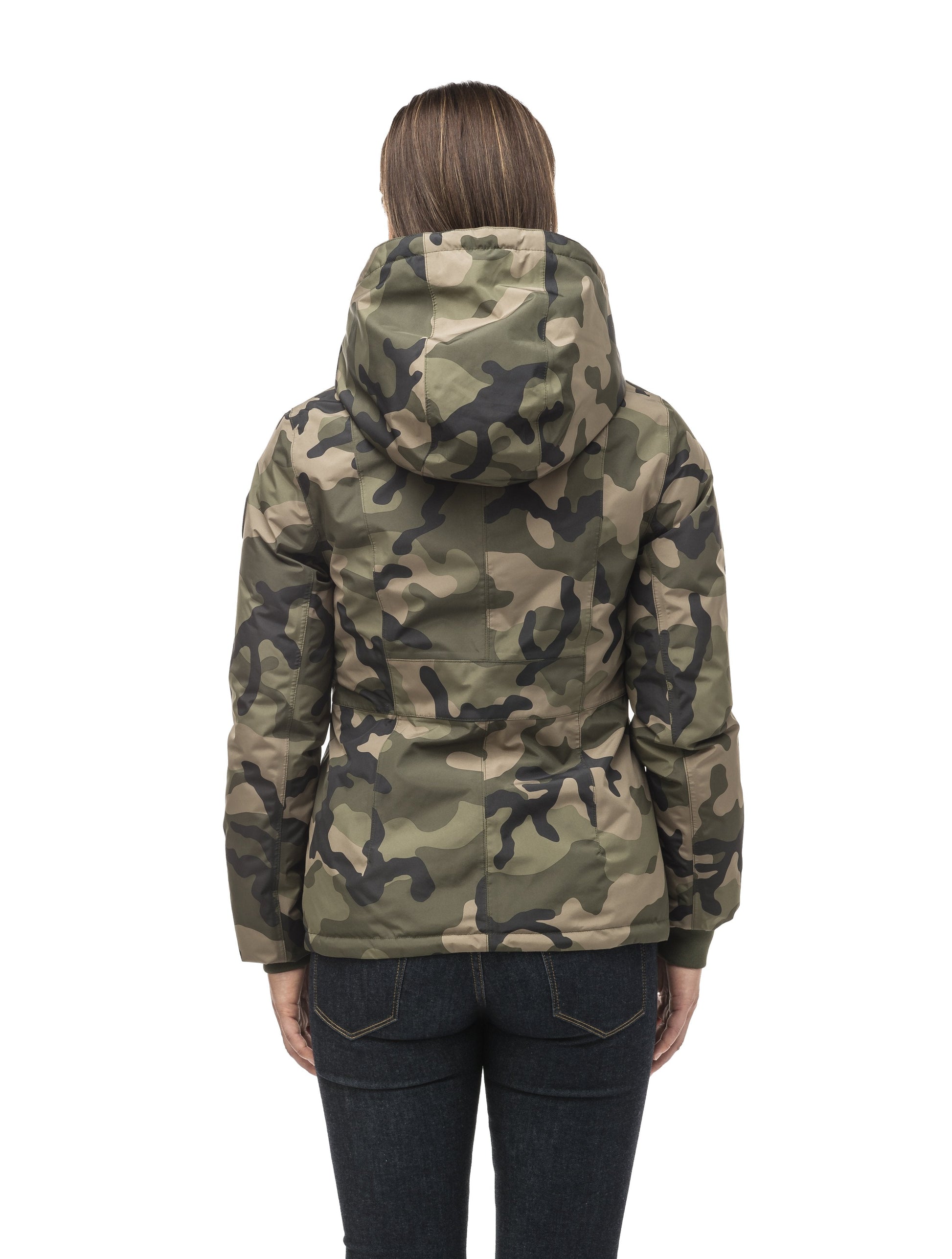 A women's two in one reversible hip length down jacket, one side is quilted and one side is solid waterproof fabric in Camo