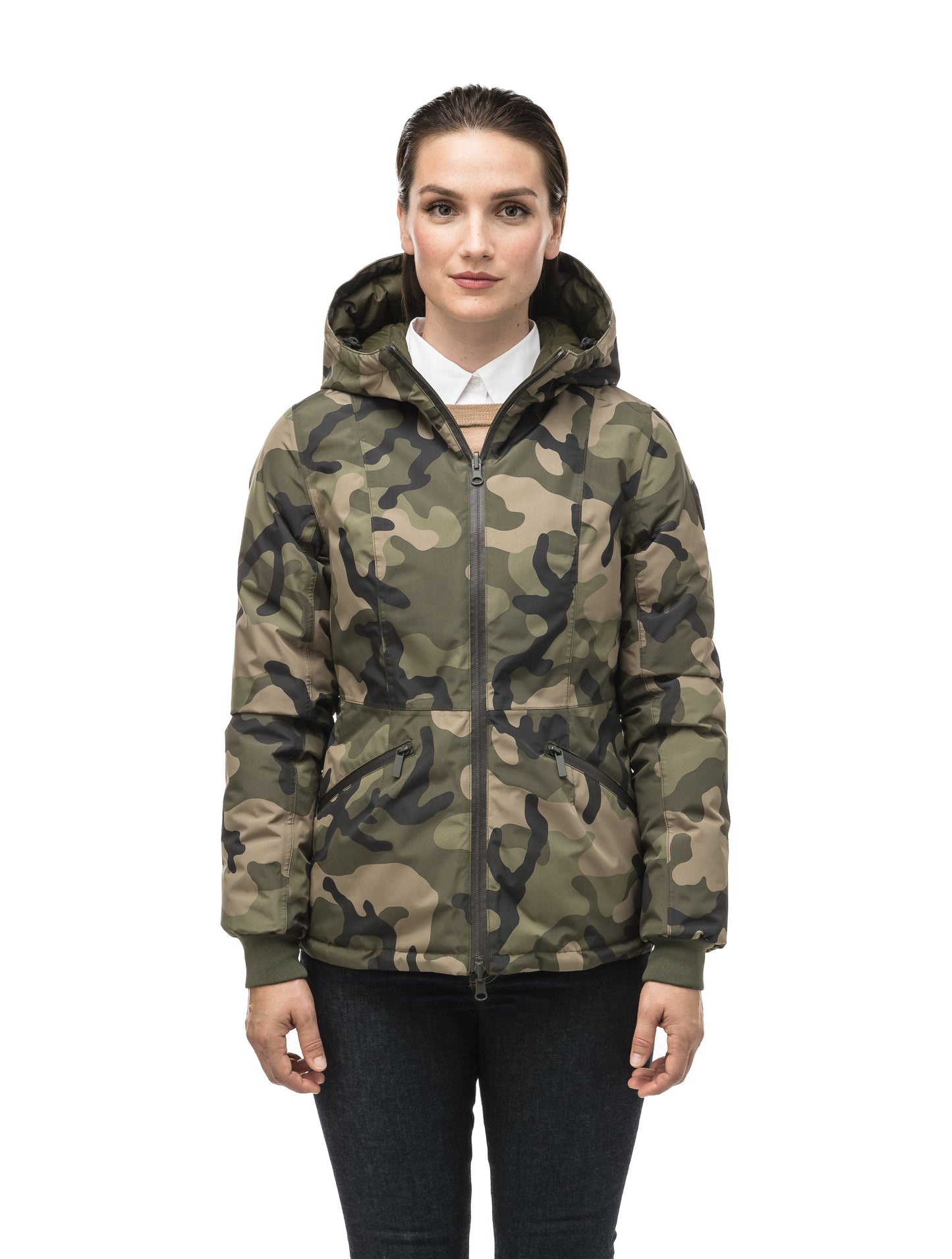 A women's two in one reversible hip length down jacket, one side is quilted and one side is solid waterproof fabric in Camo