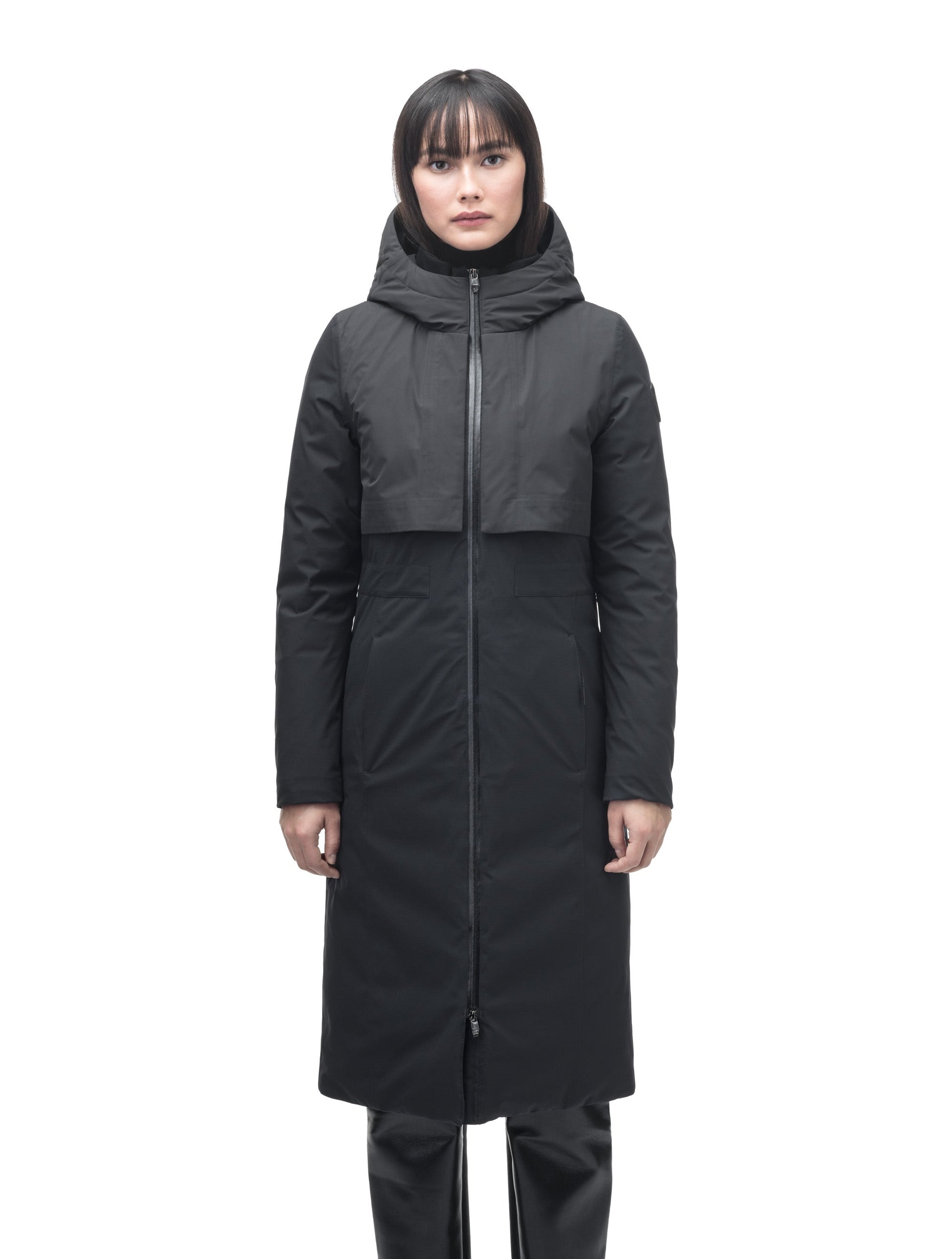 Iris Ladies Long Parka in below the knee length, Canadian duck down insulation, non-removable hood, and two-way zipper, in Black