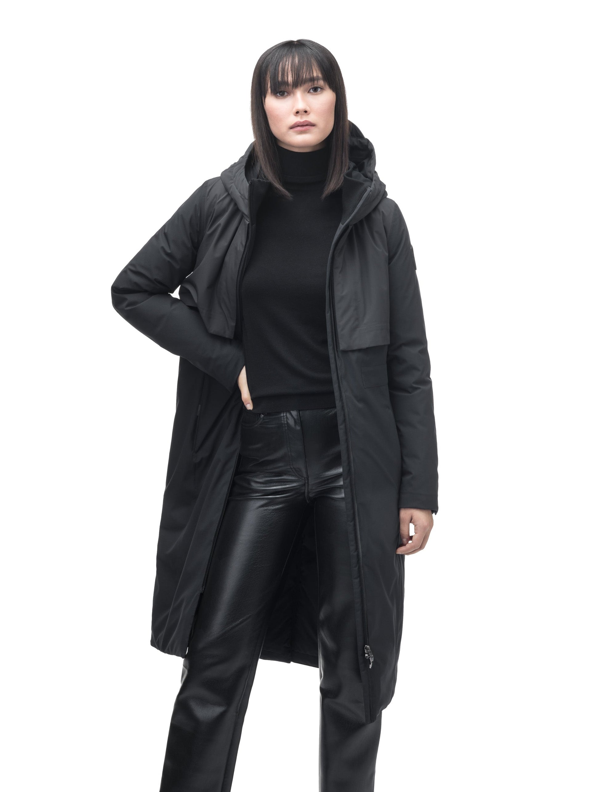 Iris Ladies Long Parka in below the knee length, Canadian duck down insulation, non-removable hood, and two-way zipper, in Black