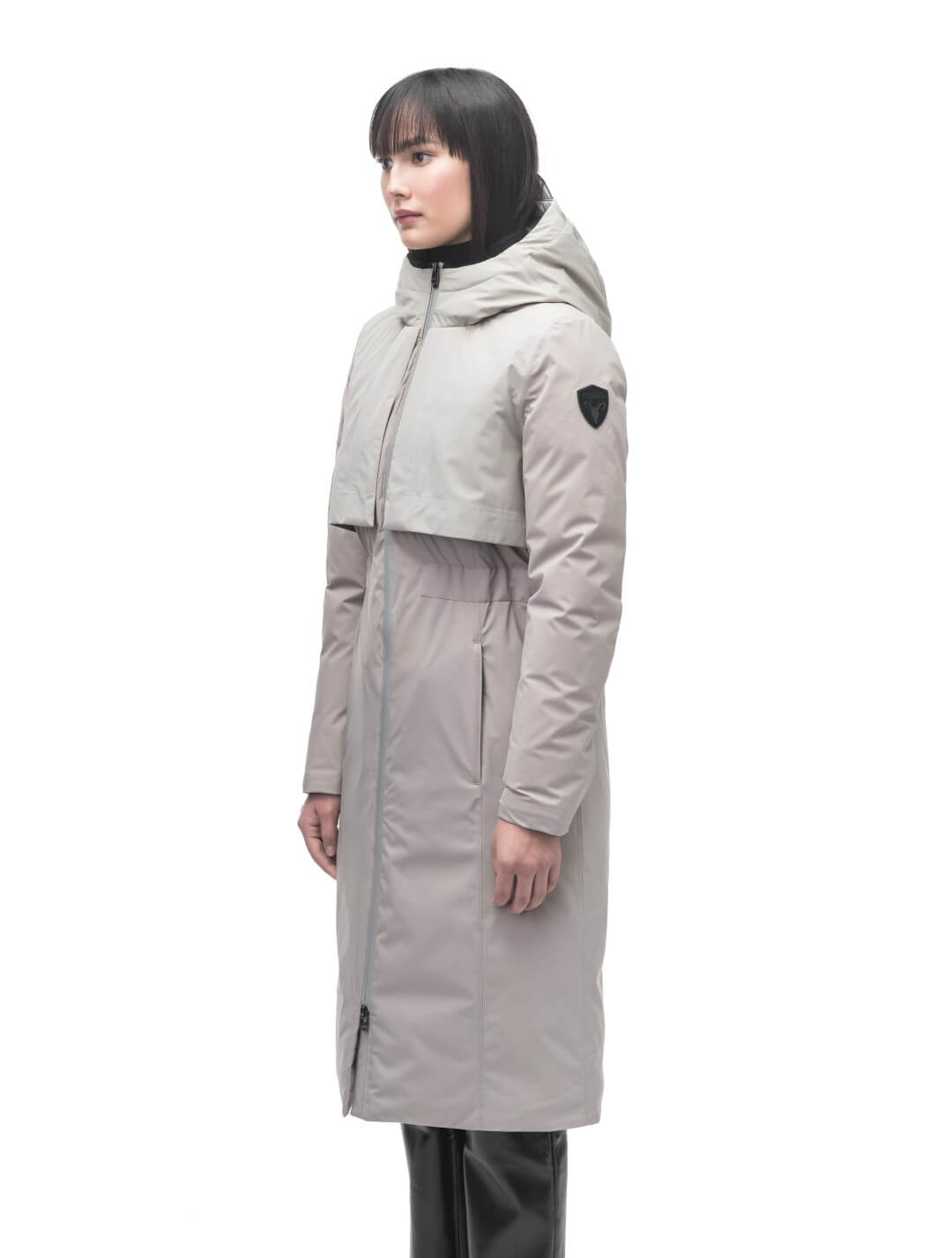 Iris Ladies Long Parka in below the knee length, Canadian duck down insulation, non-removable hood, and two-way zipper, in Clay