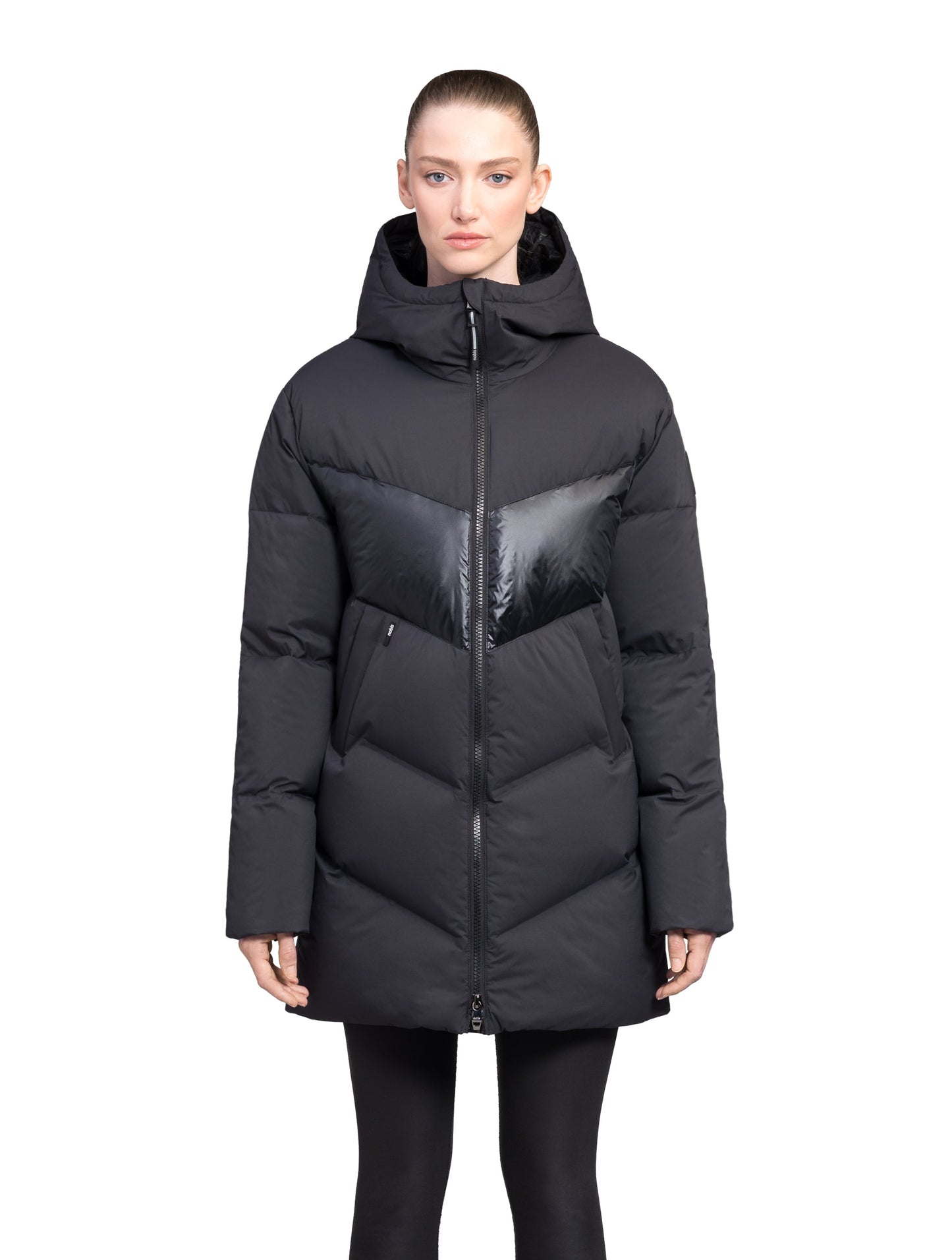 Isla Women's Chevron Quilted Puffer Jacket in thigh length, premium technical nylon taffeta fabrication, Premium Canadian origin White Duck Down insulation, non-removable down-filled hood, two-way centre-front zipper, zipper pockets at waist, contrast cire technical nylon taffeta detailing on chest and back, in Black