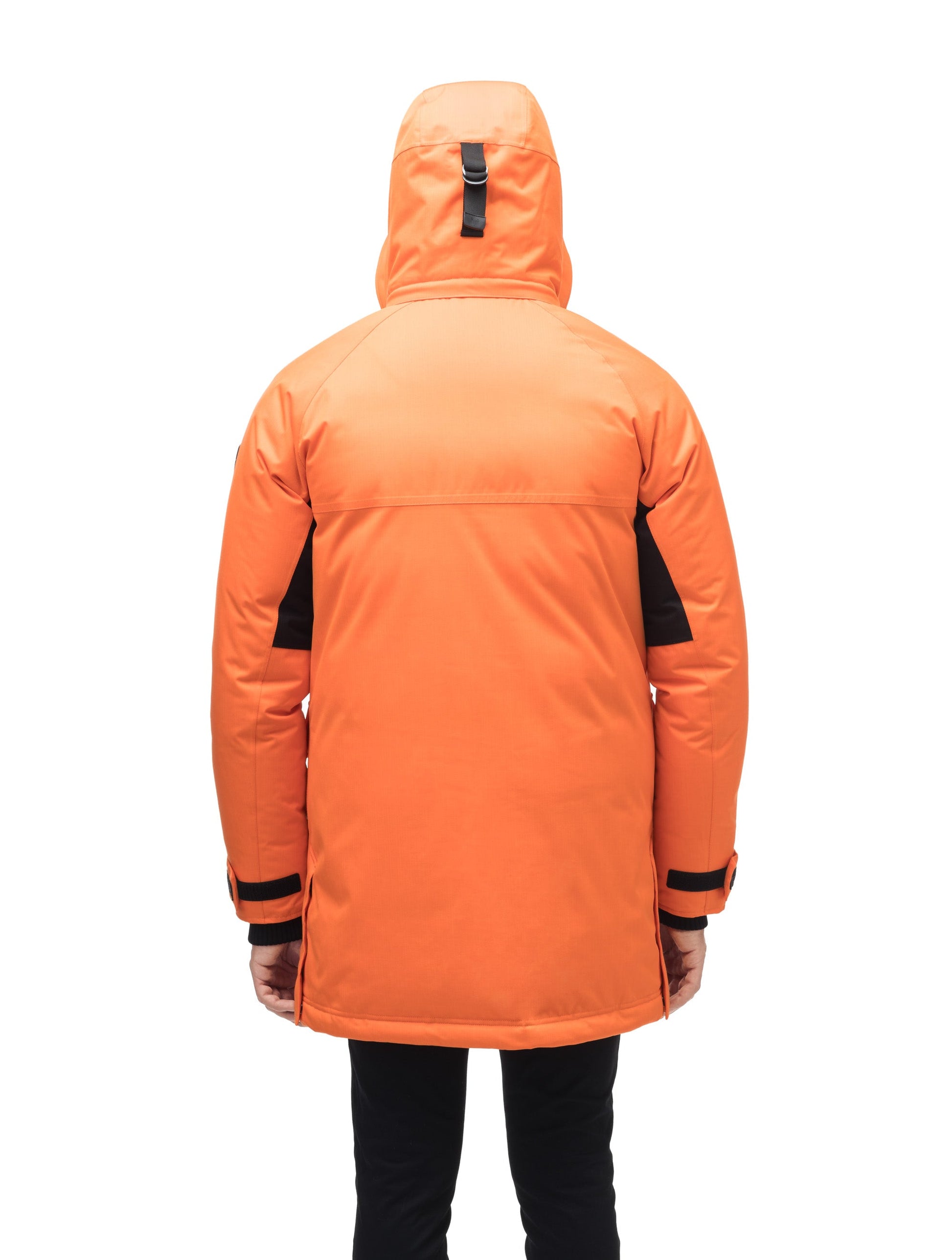 Men's thigh length down-filled parka with removable hood and removable coyote fur trim in Atomic