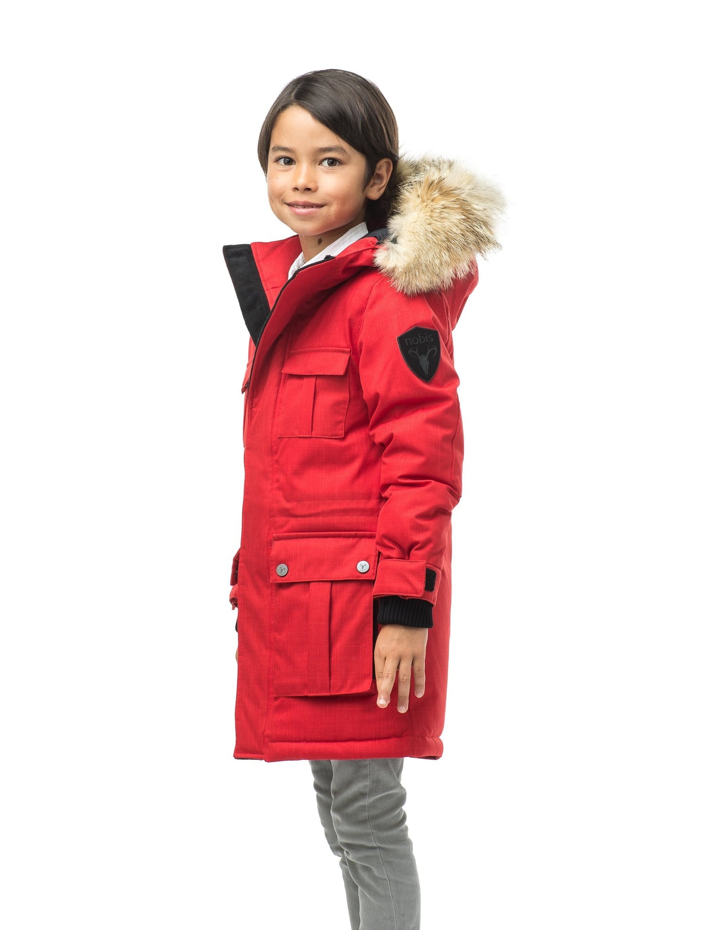 Kid's knee length parka with magnetized closure in CH Red