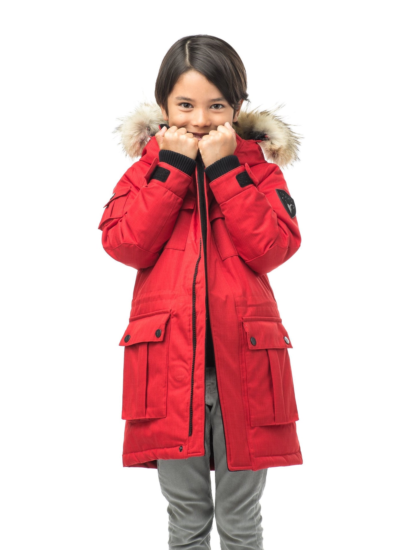 Kid's knee length parka with magnetized closure in CH Red