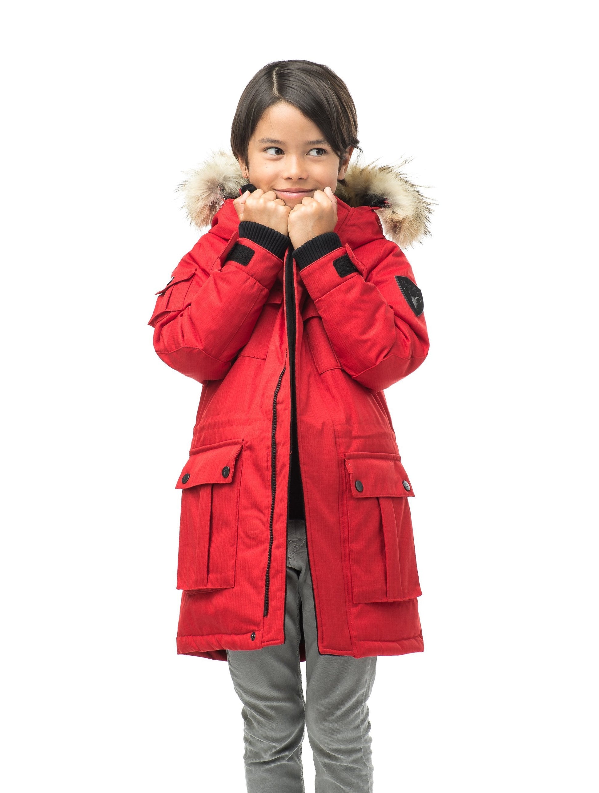 Kid's knee length parka with magnetized closure in CH Red