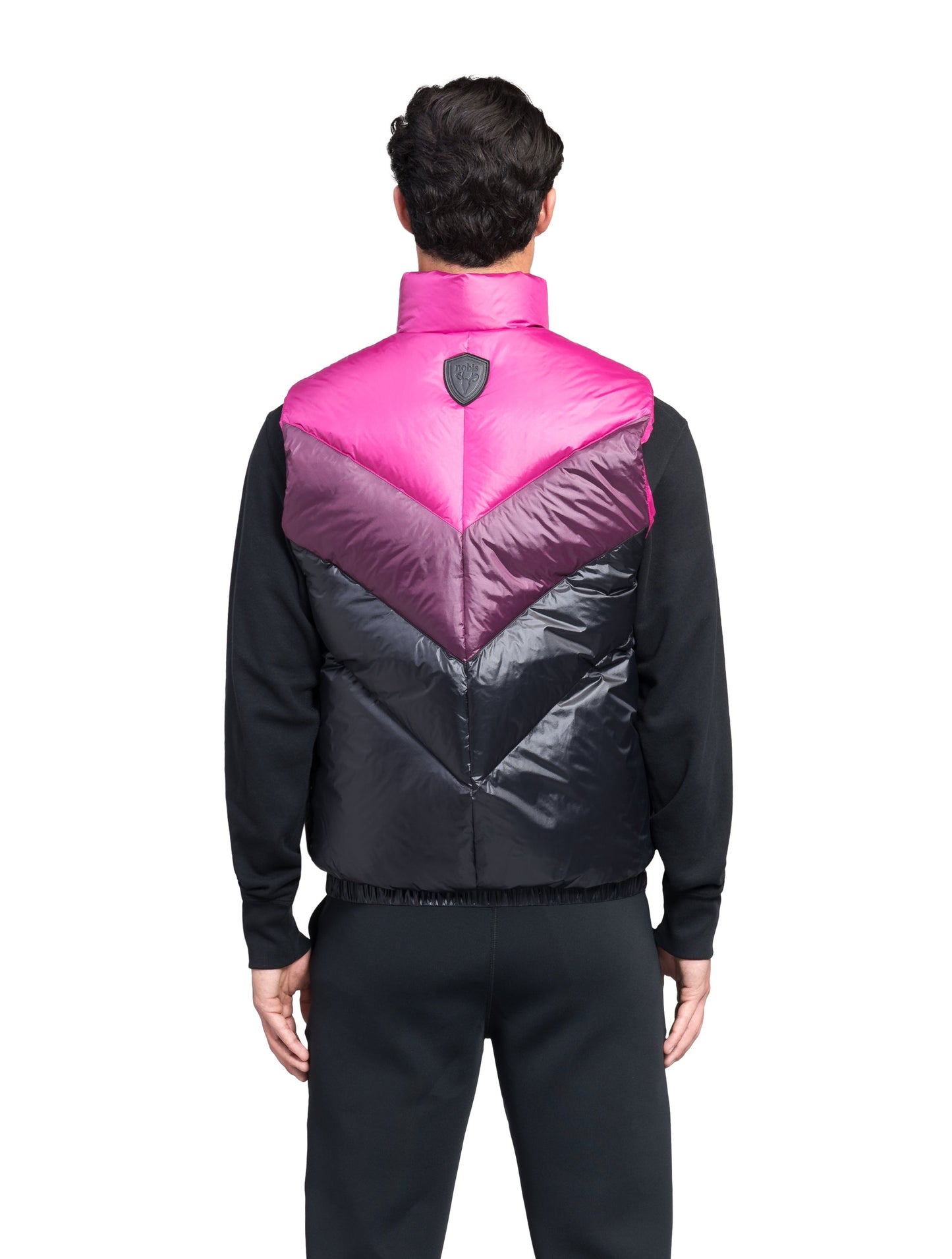 Kylo Men's Chevron Quilted Vest in hip length, premium cire technical nylon taffeta fabrication, Premium Canadian origin White Duck Down insulation, two-way centre-front zipper, fleece-lined pockets at waist, elasticized waistband, in Festival Fushia/Potent Purple