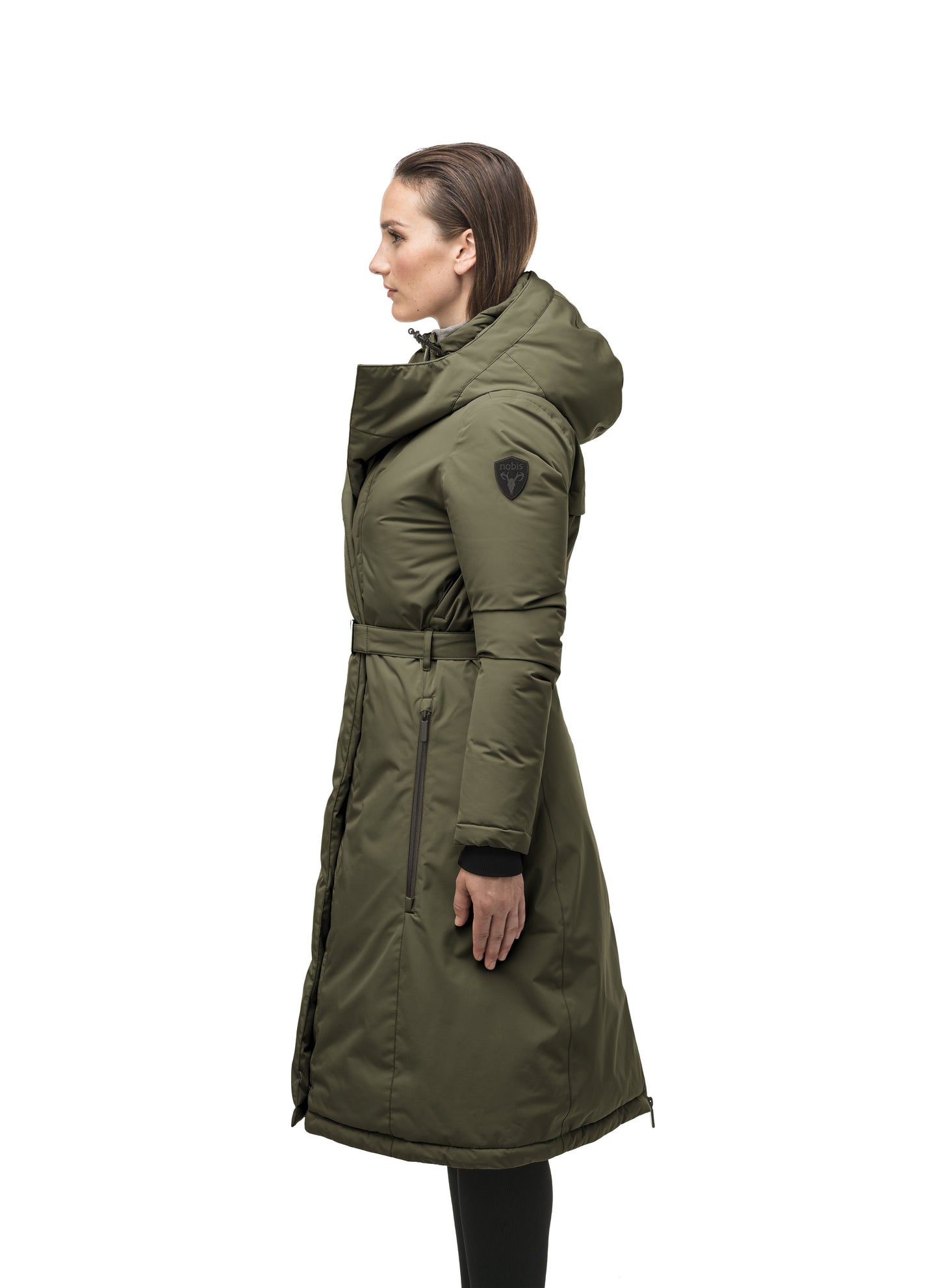 Long calf length hooded women's winter parka with an inner hip length closure, exterior hem length zipper and magentic placket in Fatigue