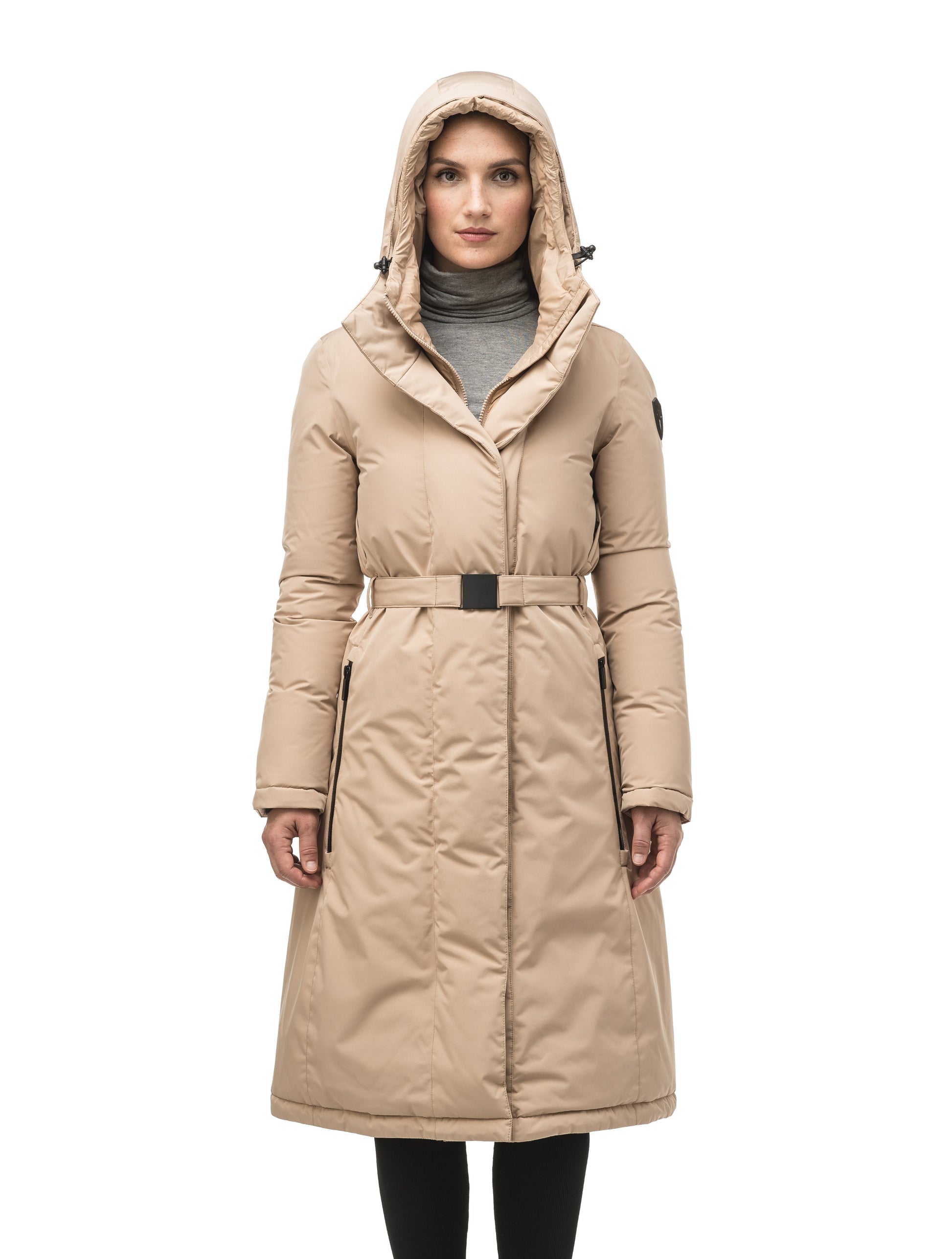 Long calf length hooded women's winter parka with an inner hip length closure, exterior hem length zipper and magentic placket in Fawn