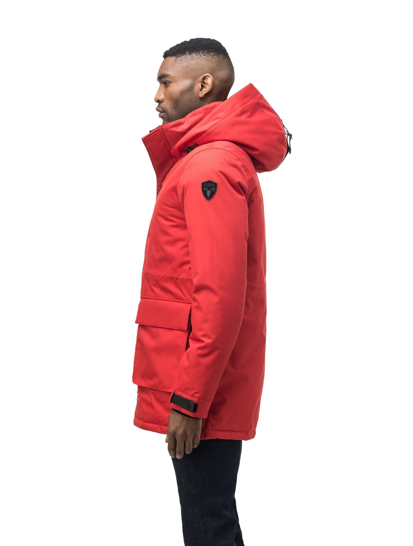 Mid weight men's down filled parka with two patch pockets at the hip and snap closure side vents in Vermillion