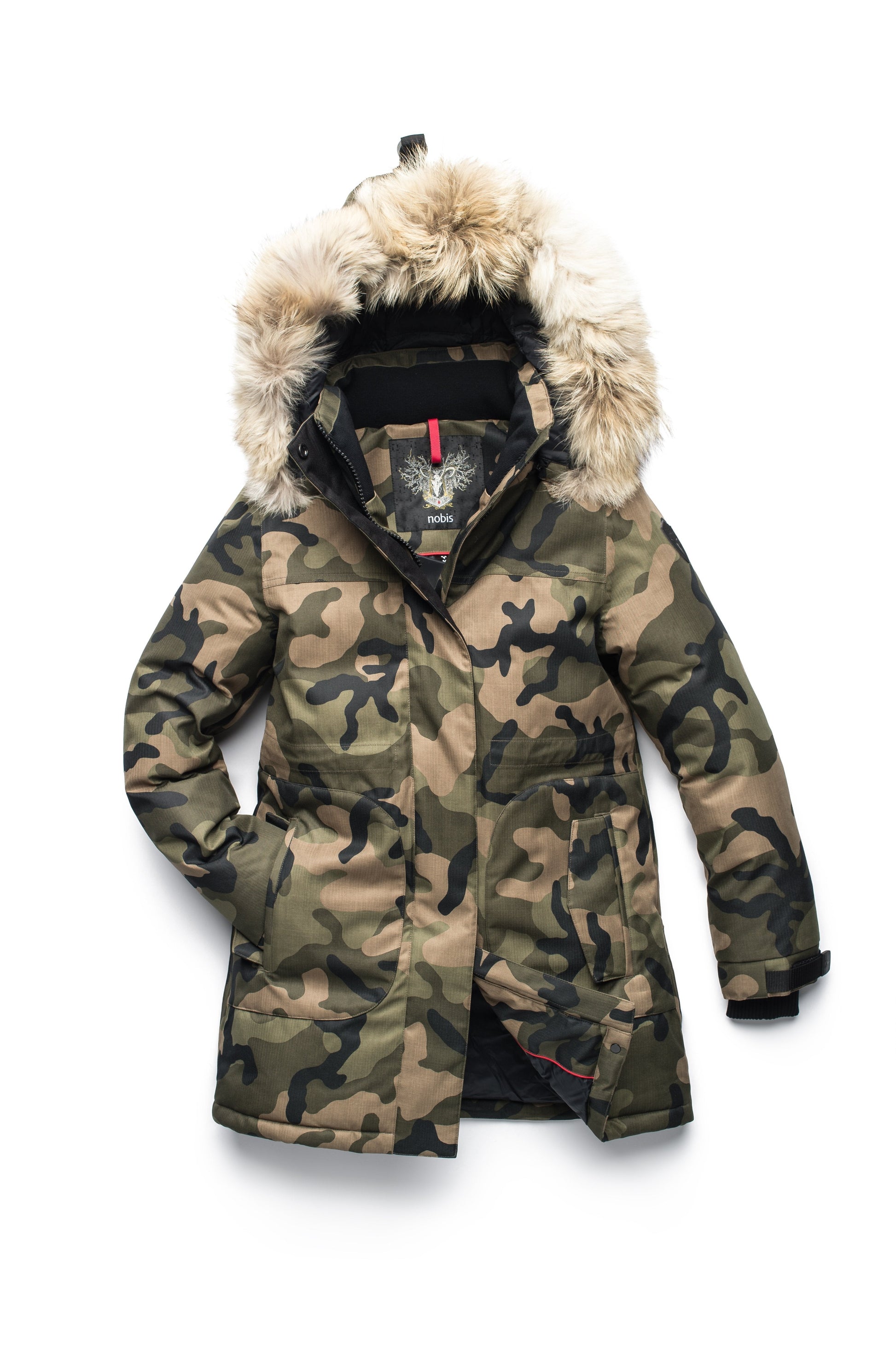 Thigh length women's down filled parka with side entry pockets and drawcord waist, removable hood and fur trim in Camo