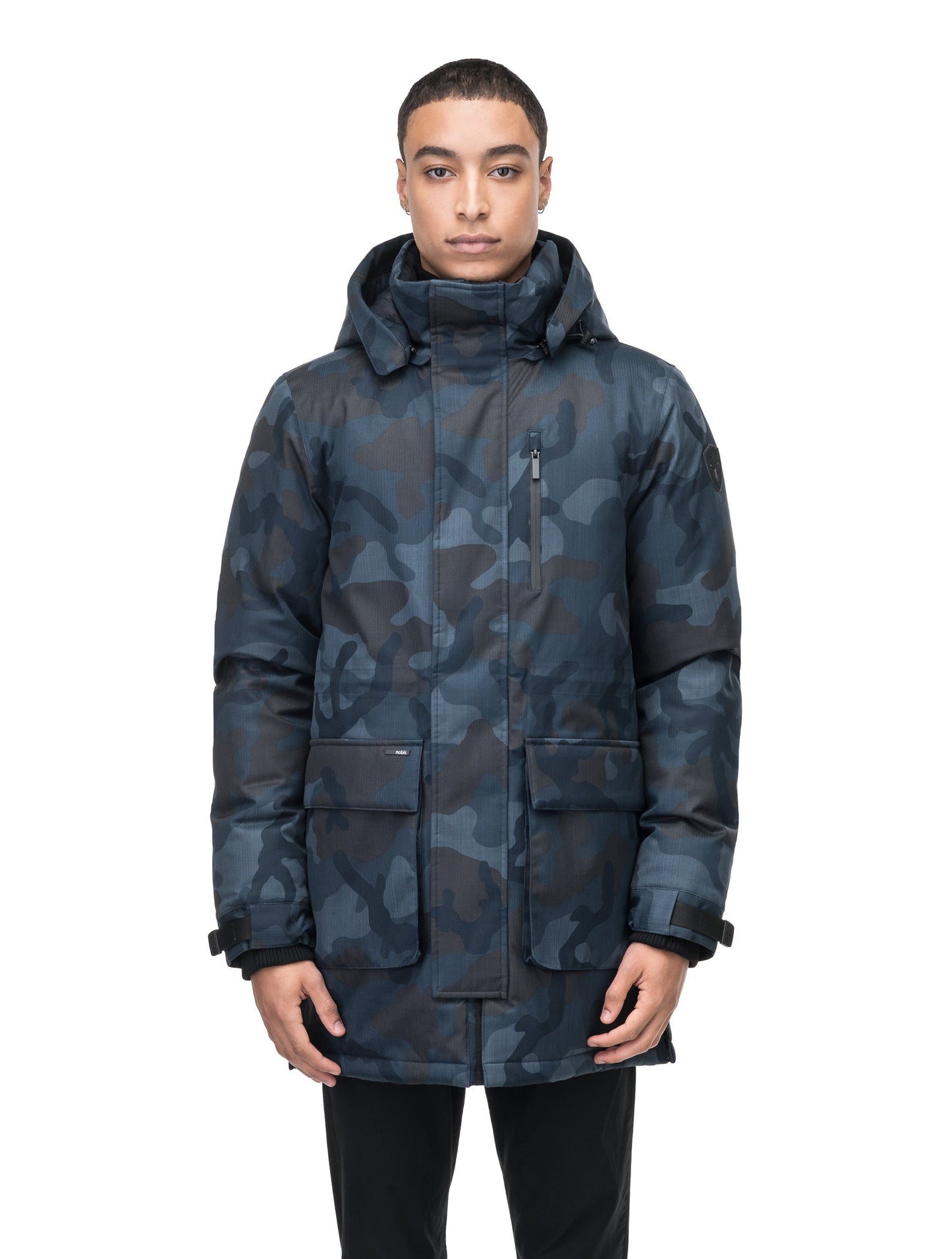 Mid weight men's down filled parka with two patch pockets at the hip and snap closure side vents in Navy Camo