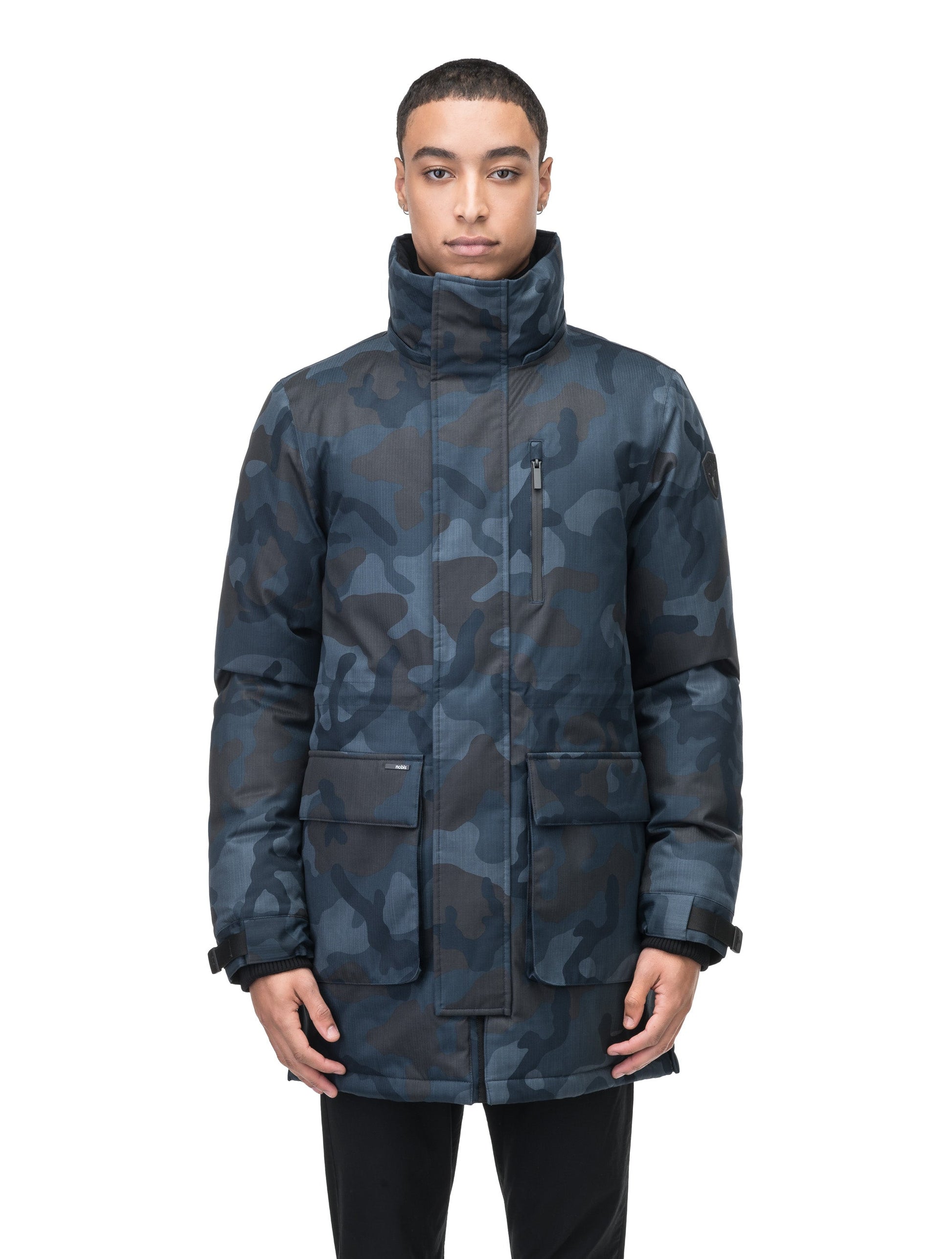 Mid weight men's down filled parka with two patch pockets at the hip and snap closure side vents in Navy Camo