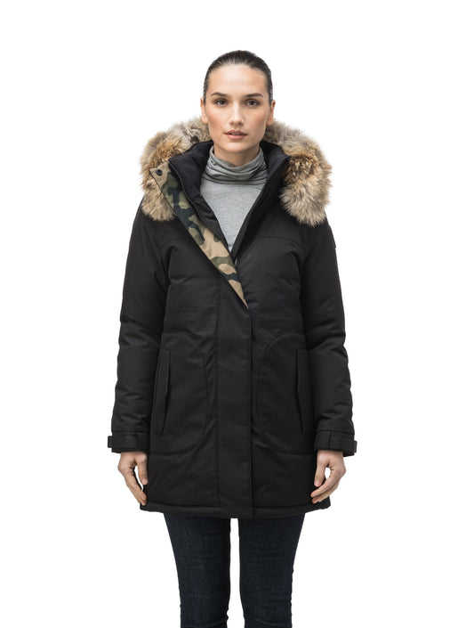 Thigh length women's down filled parka with side entry pockets and drawcord waist, removable hood and fur trim in Black + Black