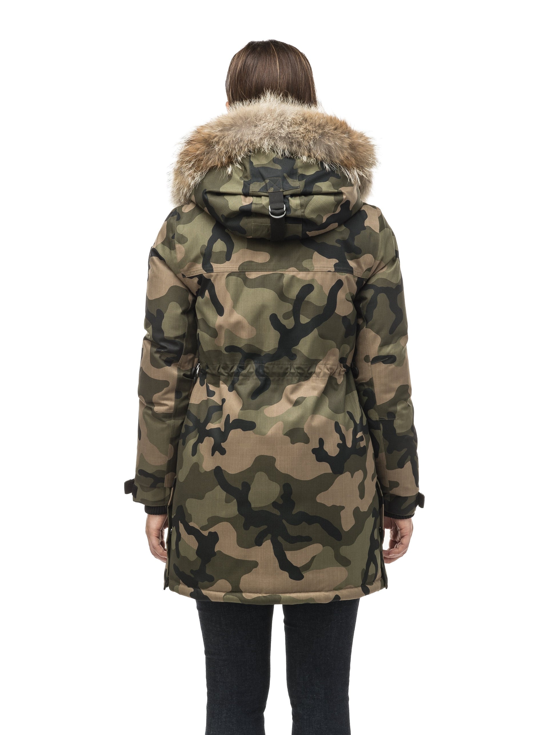 Thigh length women's down filled parka with side entry pockets and drawcord waist, removable hood and fur trim in Camo