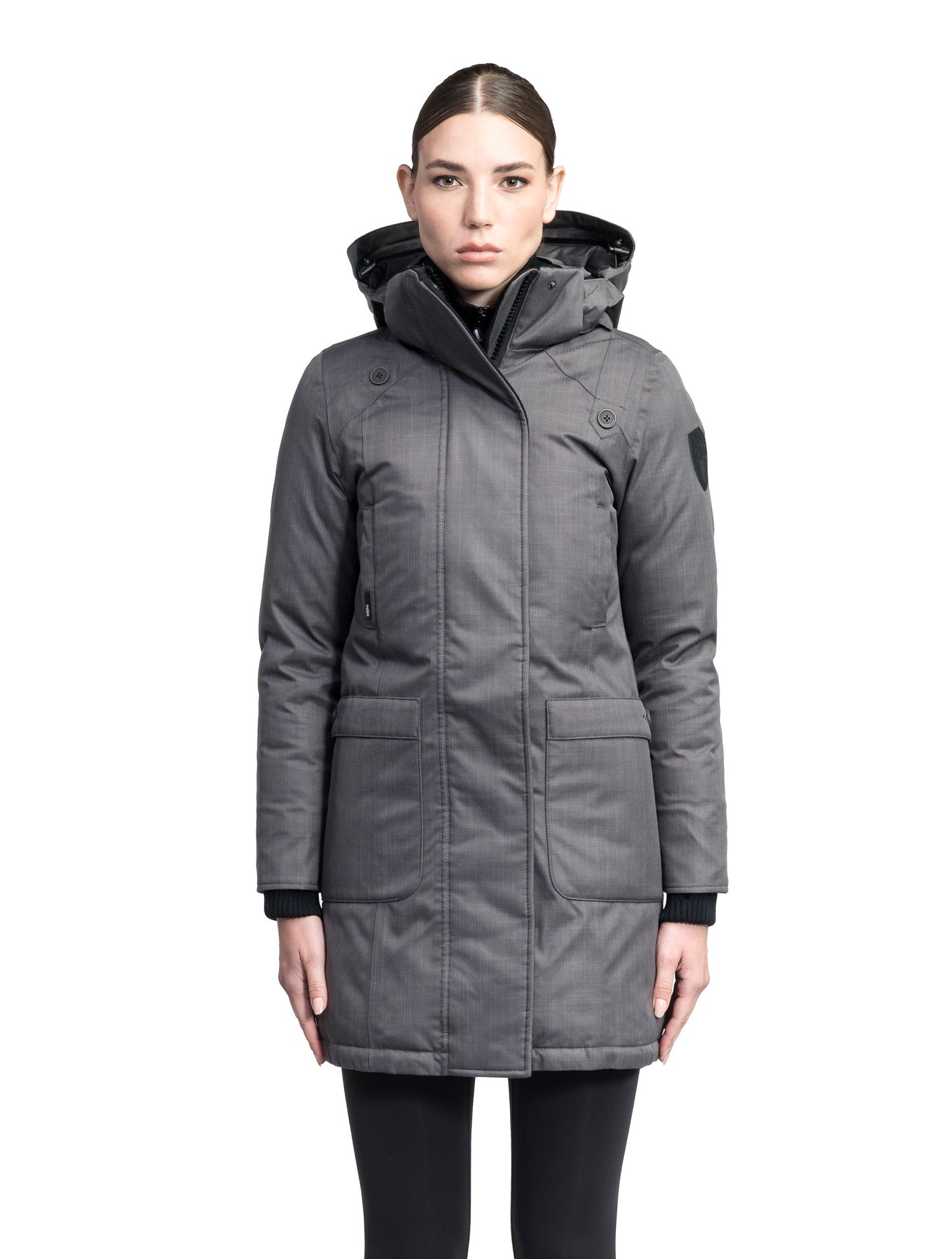 Merideth Furless Ladies Parka in thigh length, Canadian white duck down insulation, removable down-filled hood, centre-front two-way zipper with magnetic wind flap closure, four exterior pockets, and elastic ribbed cuffs, in Steel Grey