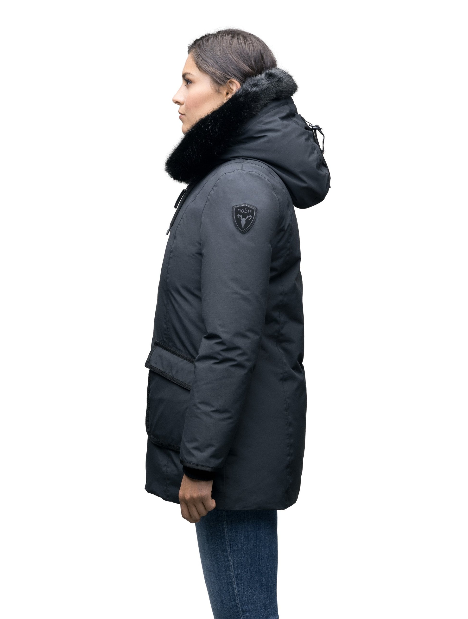 Women's hip length down parka with tonal fur trim in Cy Black