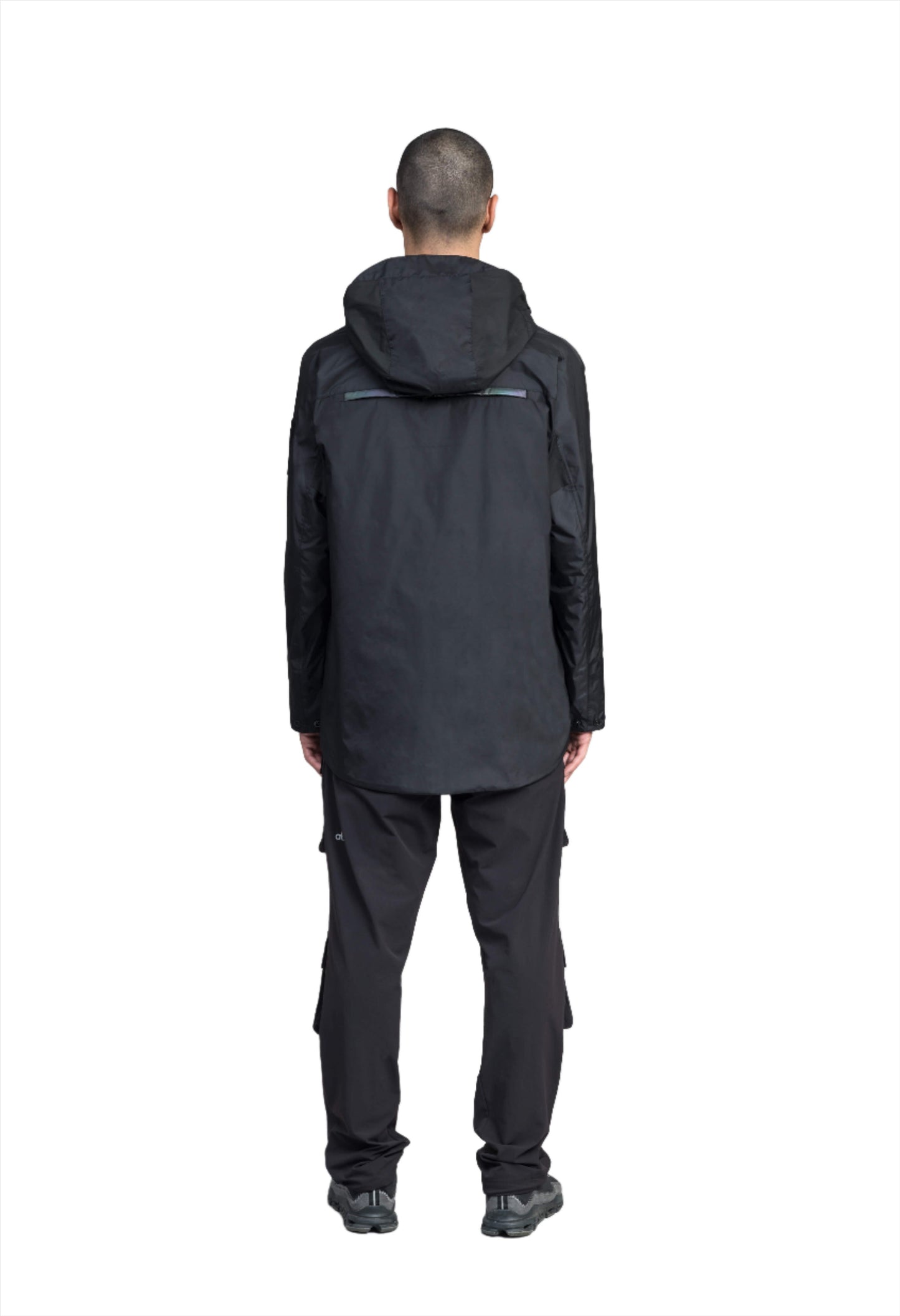 Mission Men's Performance Rain Shell Jacket in hip length, non-removable hood with adjustable toggle, two-way waterproof zipper, flap closure waist pockets with additional side entry storage, zipper ventilation on back, passive underarm ventilation, and breathable mesh lining, in Black