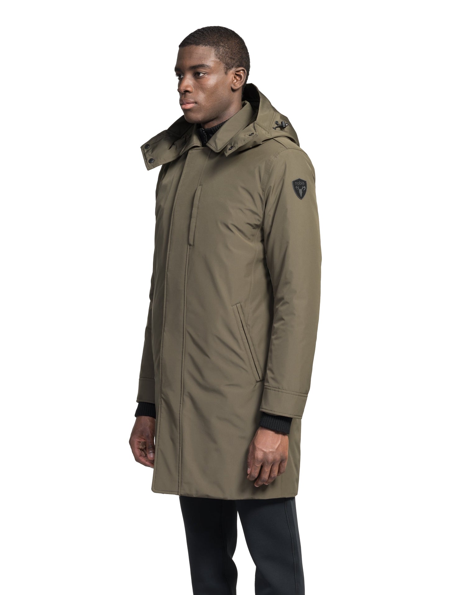 Nord Men's Tailored Trench Coat in knee length, 3-Ply Micro Denier and 4-Way Durable Stretch Weave fabrication, Premium Canadian White Duck Down insulation, removable down-filled hood, exterior zipper pocket at left chest, and adjustable snap button cuffs, in Fatigue/Eden