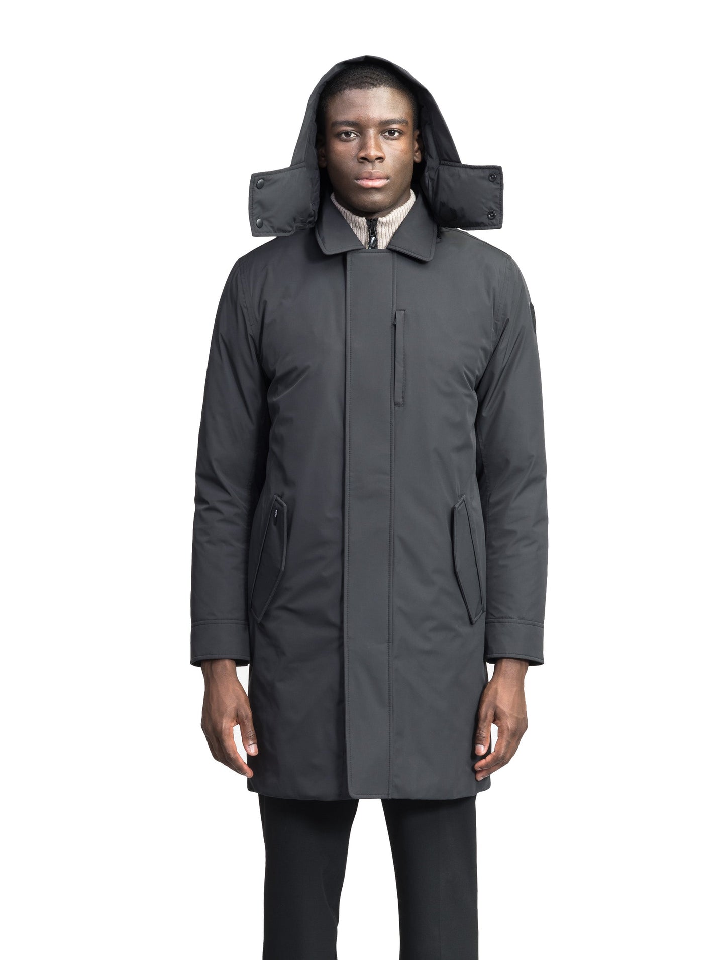 Nord Men's Tailored Trench Coat in knee length, 3-Ply Micro Denier and 4-Way Durable Stretch Weave fabrication, Premium Canadian White Duck Down insulation, removable down-filled hood, exterior zipper pocket at left chest, and adjustable snap button cuffs, in Black