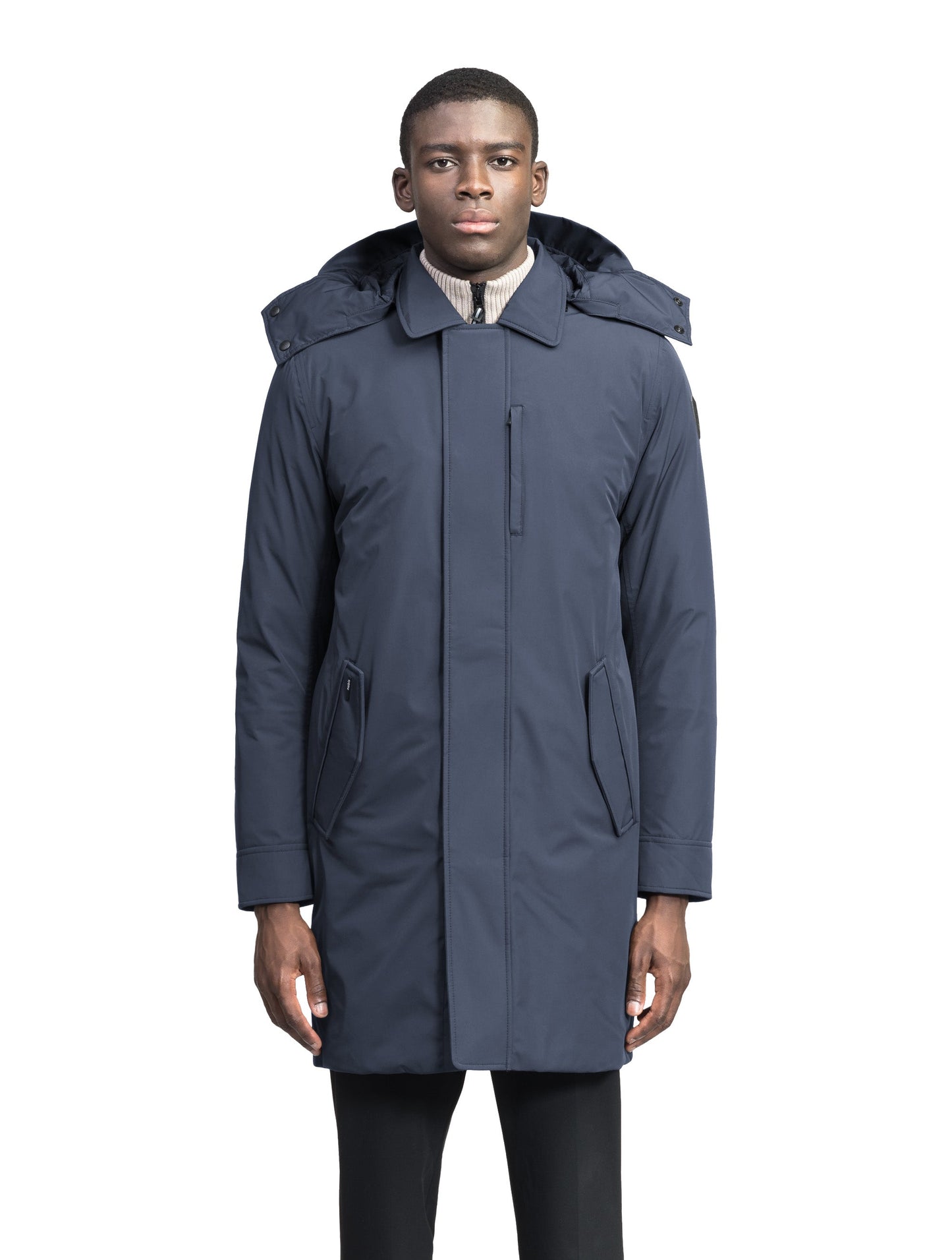 Nord Men's Tailored Trench Coat in knee length, 3-Ply Micro Denier and 4-Way Durable Stretch Weave fabrication, Premium Canadian White Duck Down insulation, removable down-filled hood, exterior zipper pocket at left chest, and adjustable snap button cuffs, in Marine