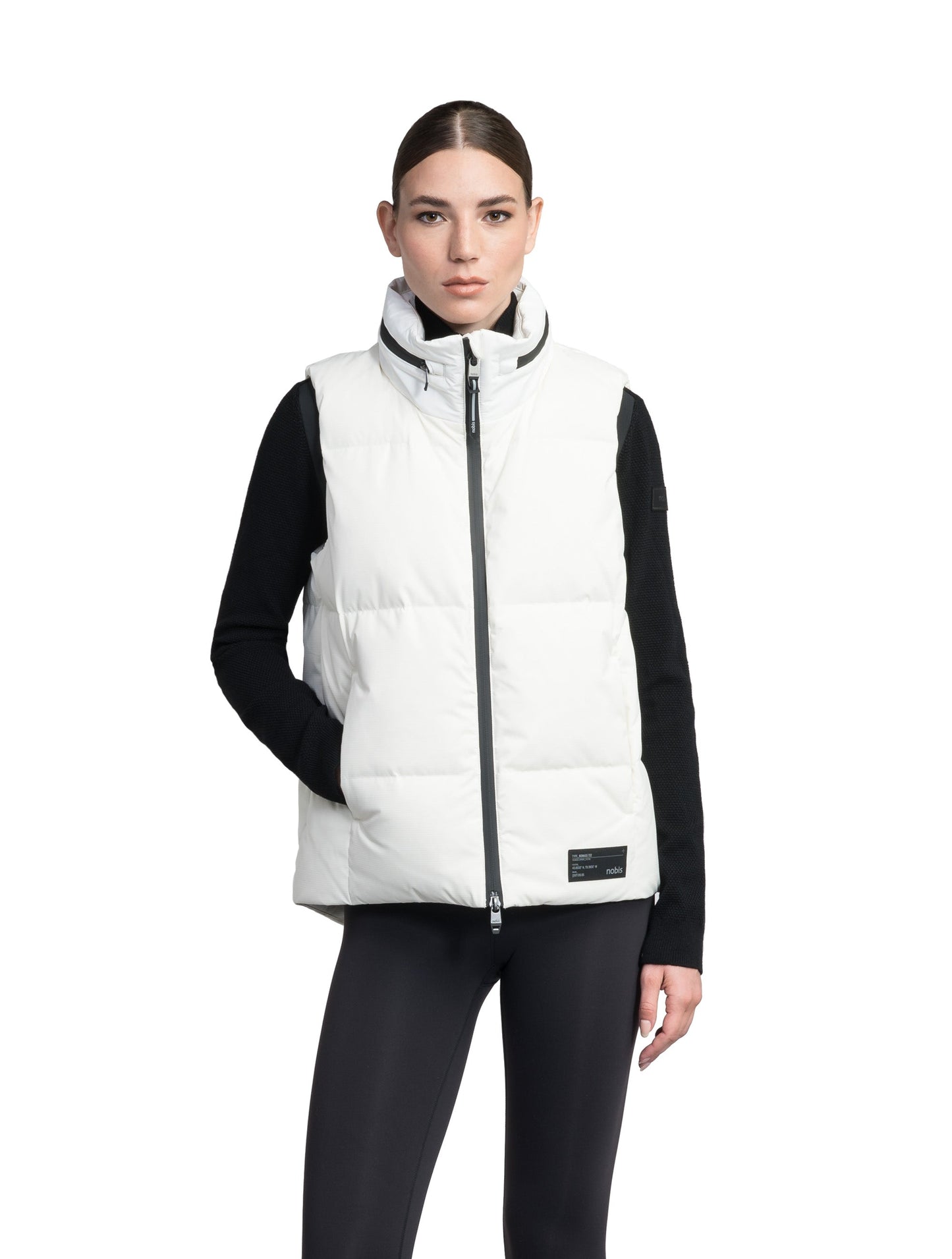 Oren Ladies Performance Vest in hip length, Durable Stretch Ripstop and 3-Ply Micro Denier fabrication, Premium Canadian White Duck Down insulation, tuck-away waterproof hood, and two-way centre front zipper, in Chalk