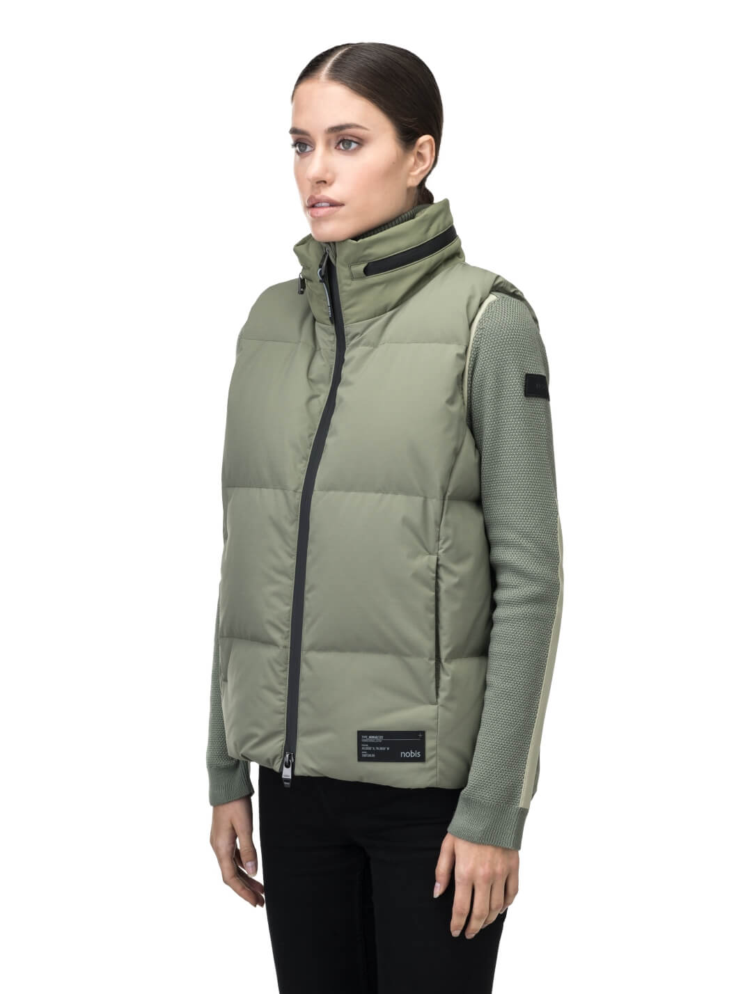 Oren Ladies Performance Vest in hip length, Durable Stretch Ripstop and 3-Ply Micro Denier fabrication, Premium Canadian White Duck Down insulation, tuck-away waterproof hood, and two-way centre front zipper, in Clover