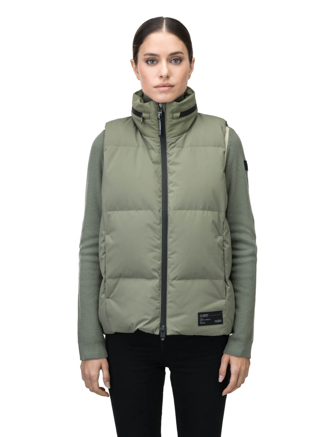 Oren Ladies Performance Vest in hip length, Durable Stretch Ripstop and 3-Ply Micro Denier fabrication, Premium Canadian White Duck Down insulation, tuck-away waterproof hood, and two-way centre front zipper, in Clover