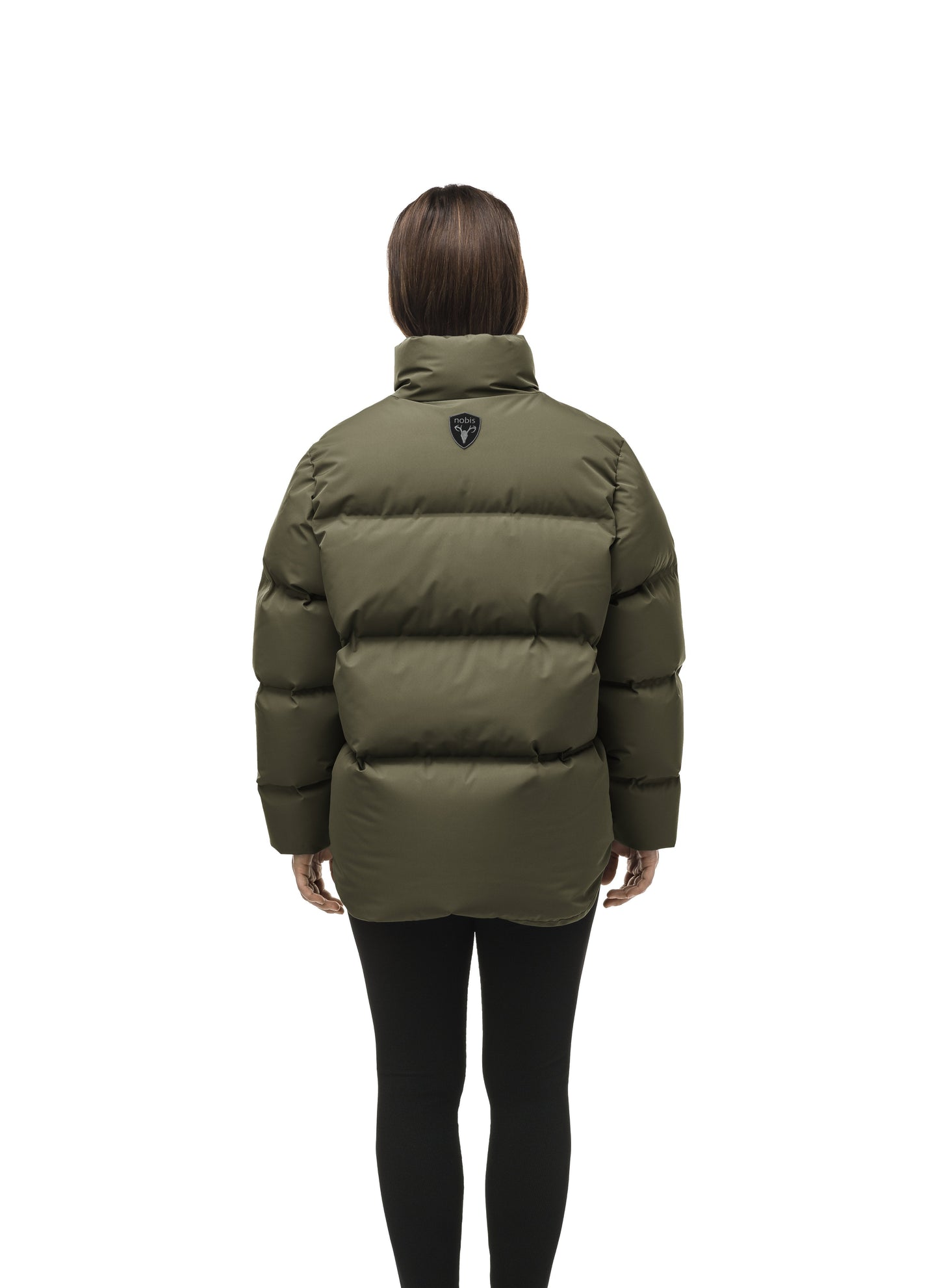 Women's puffer jacket with a minimalist modern design; featuring graphic details like oversized tonal branding, an exposed zipper, and seamless puffer channels to lock in the Premium Canadian Origin White Duck Down in Fatigue