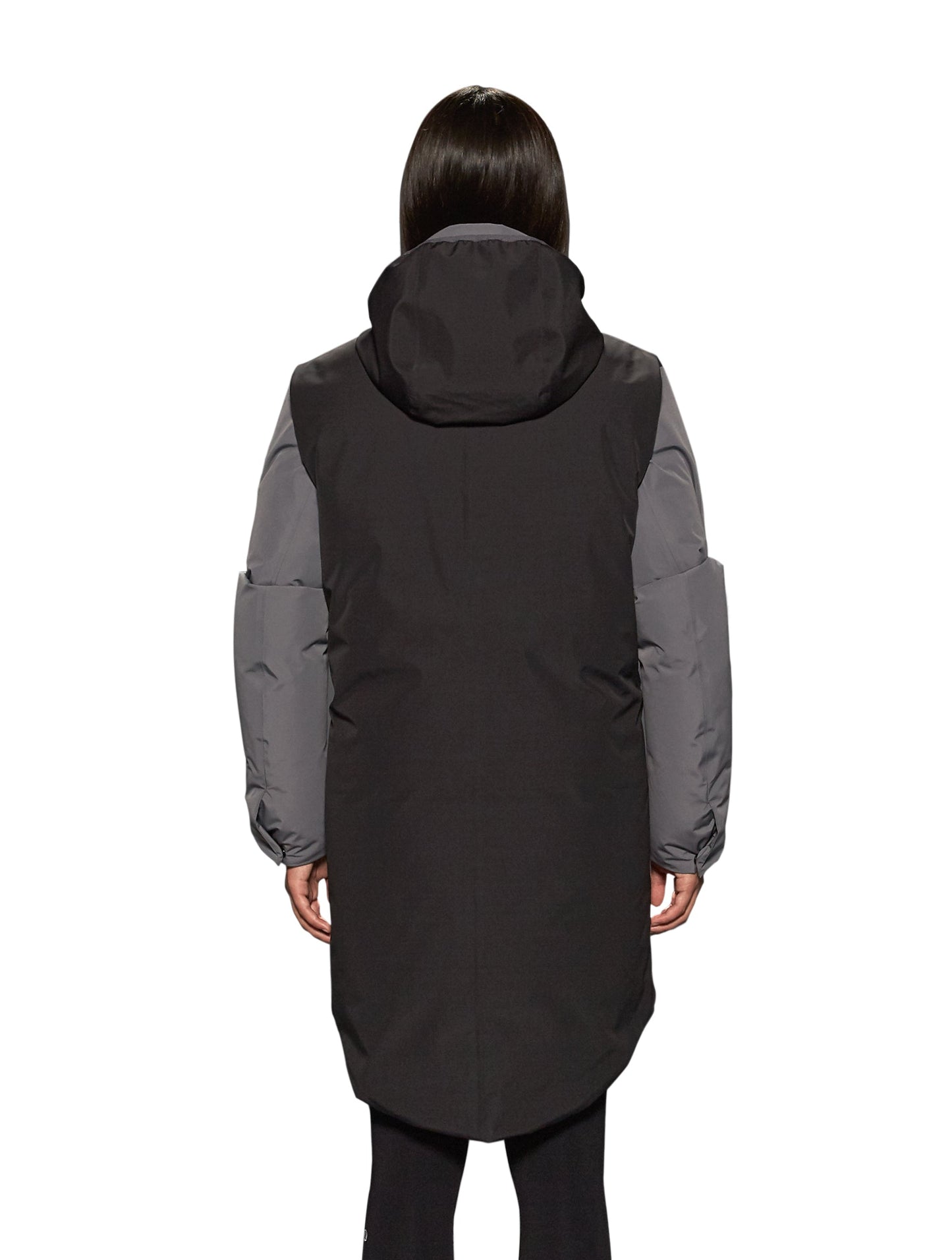 Unisex thigh length down parka with a contrast colour back panel, hidable waterproof hood, and hidden zipper pockets at chest and waist, in Concrete/Black