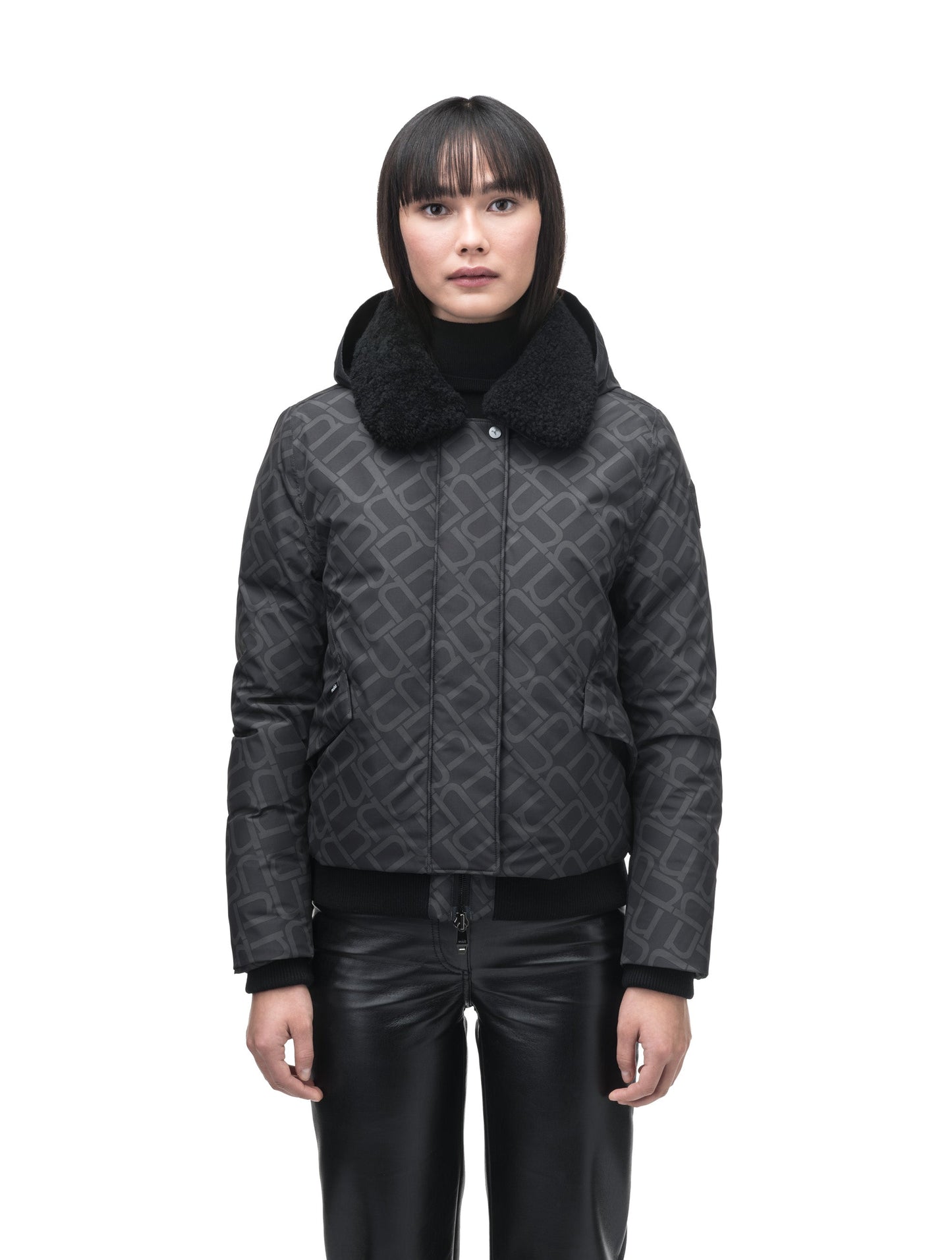 Rae Ladies Aviator Jacket in hip length, Canadian duck down insulation, removable shearling collar with hidden tuckable hood, and two-way front zipper, in Dark Monogram