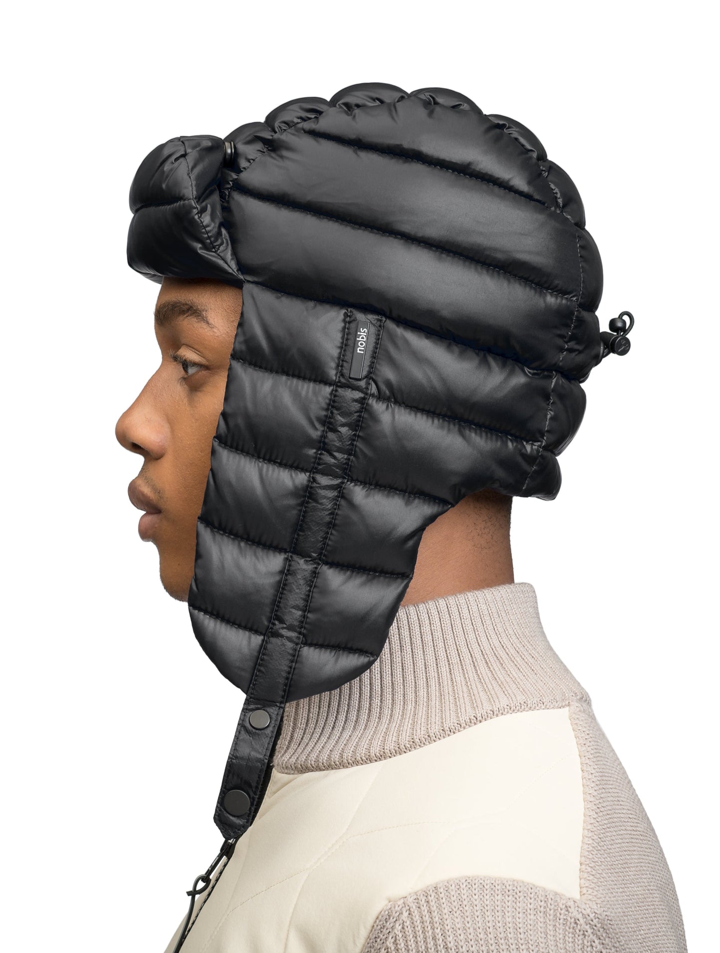 Unisex down-filled quilted fargo hat with adjustable chin strap in Black