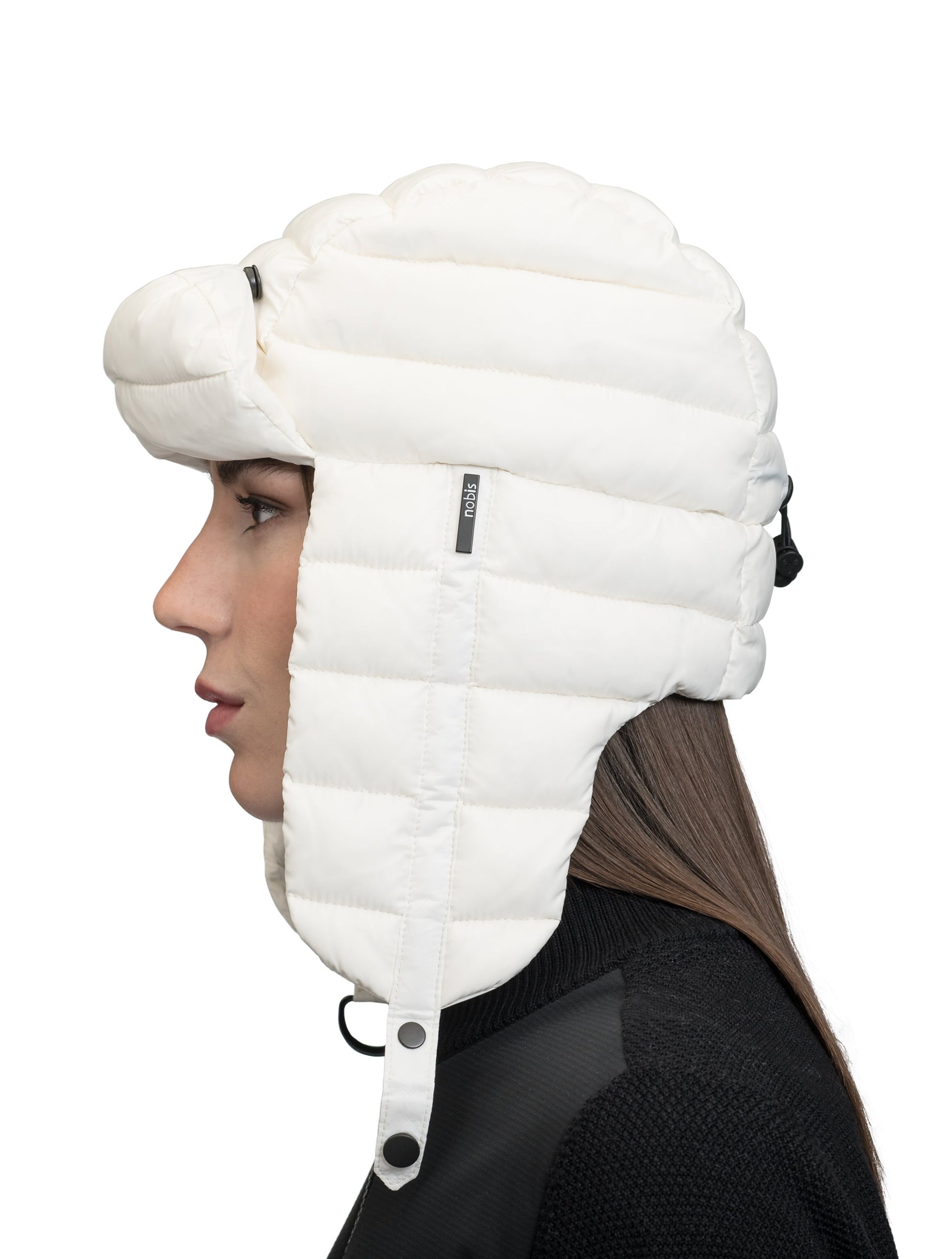 Unisex down-filled quilted fargo hat with adjustable chin strap in Chalk