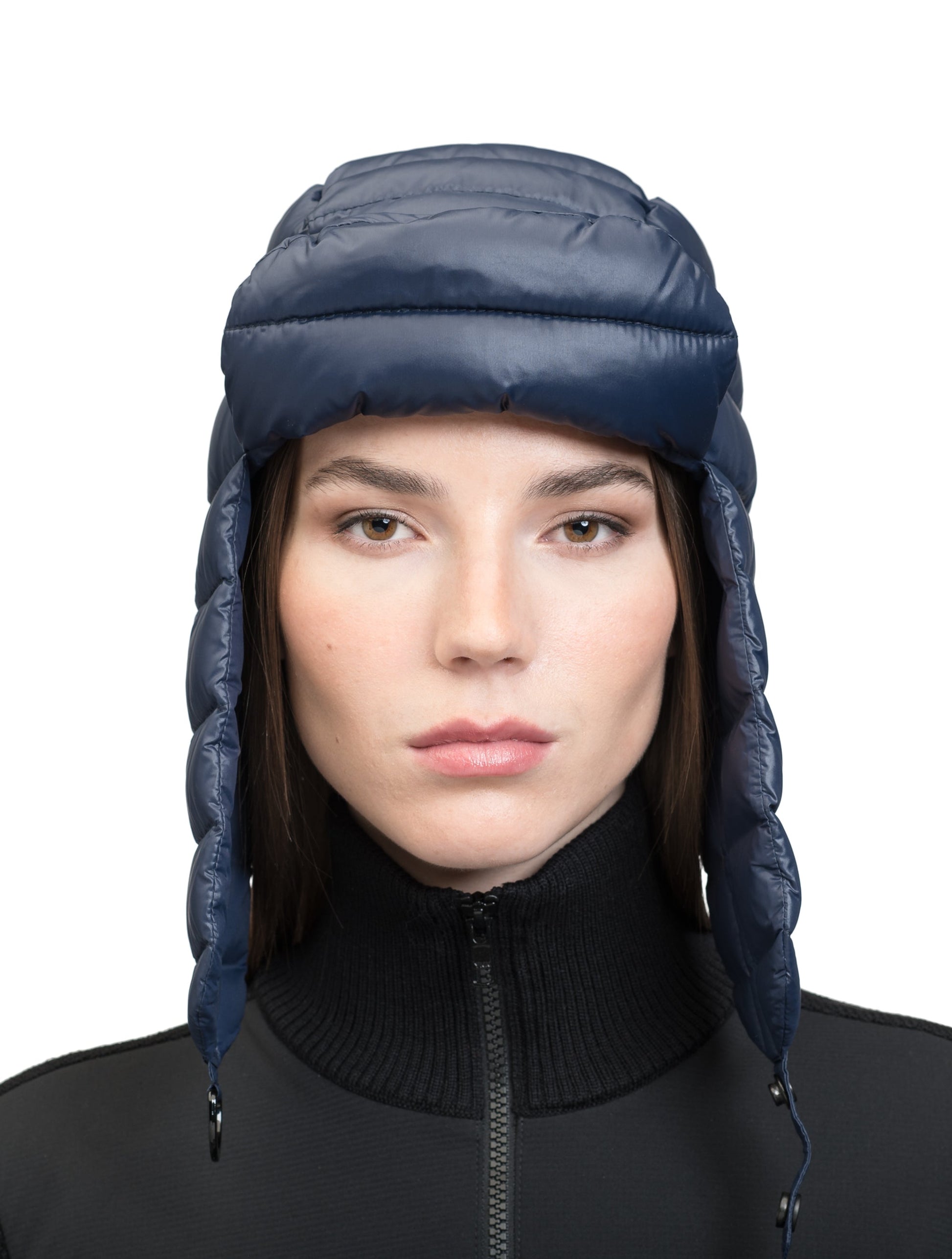 Unisex down-filled quilted fargo hat with adjustable chin strap in Marine