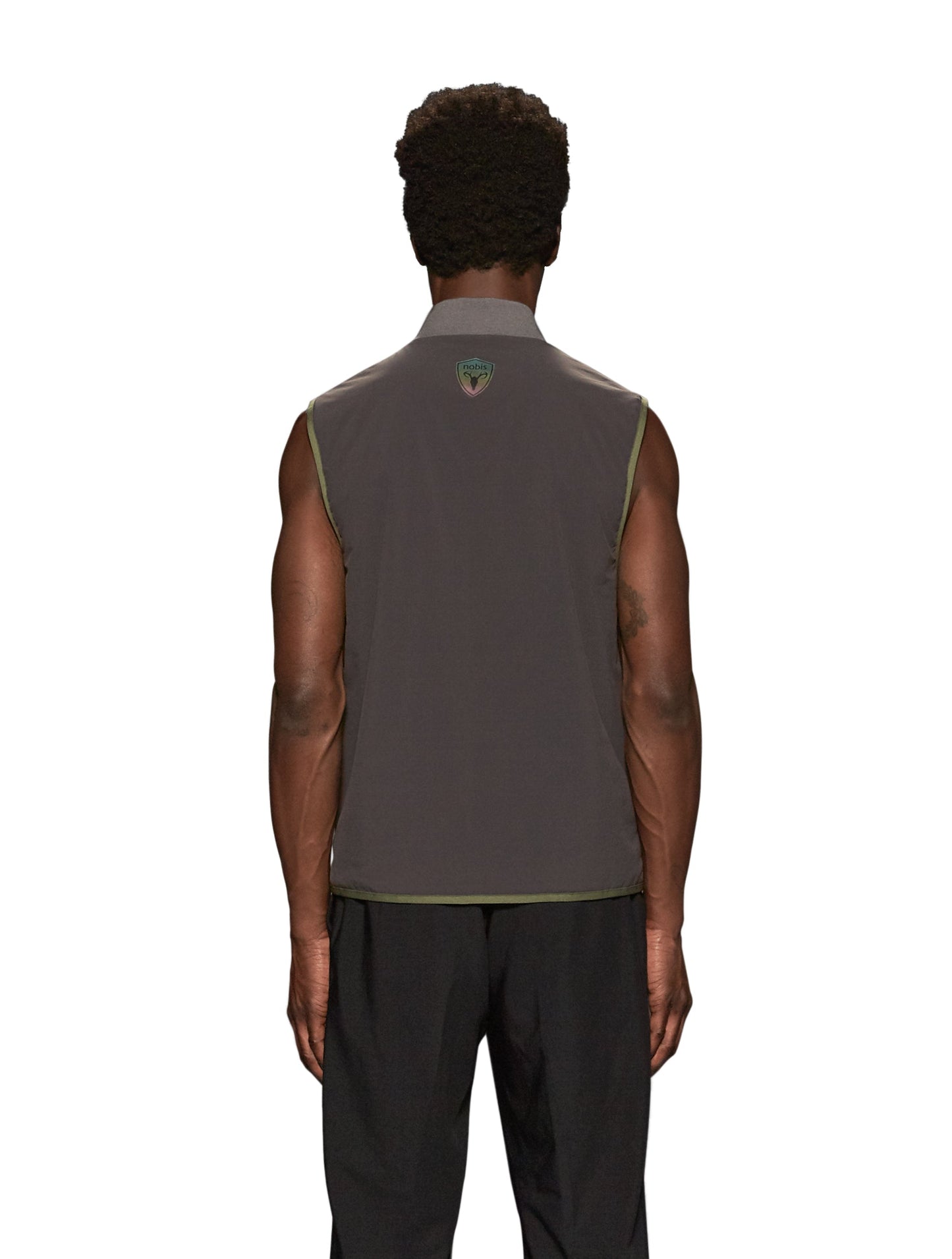 Unisex hip length vest with a contrast colour back panel, and hidden zipper pockets at waist, and an invisible zipper pocket at chest, in Fatigue/Licorice