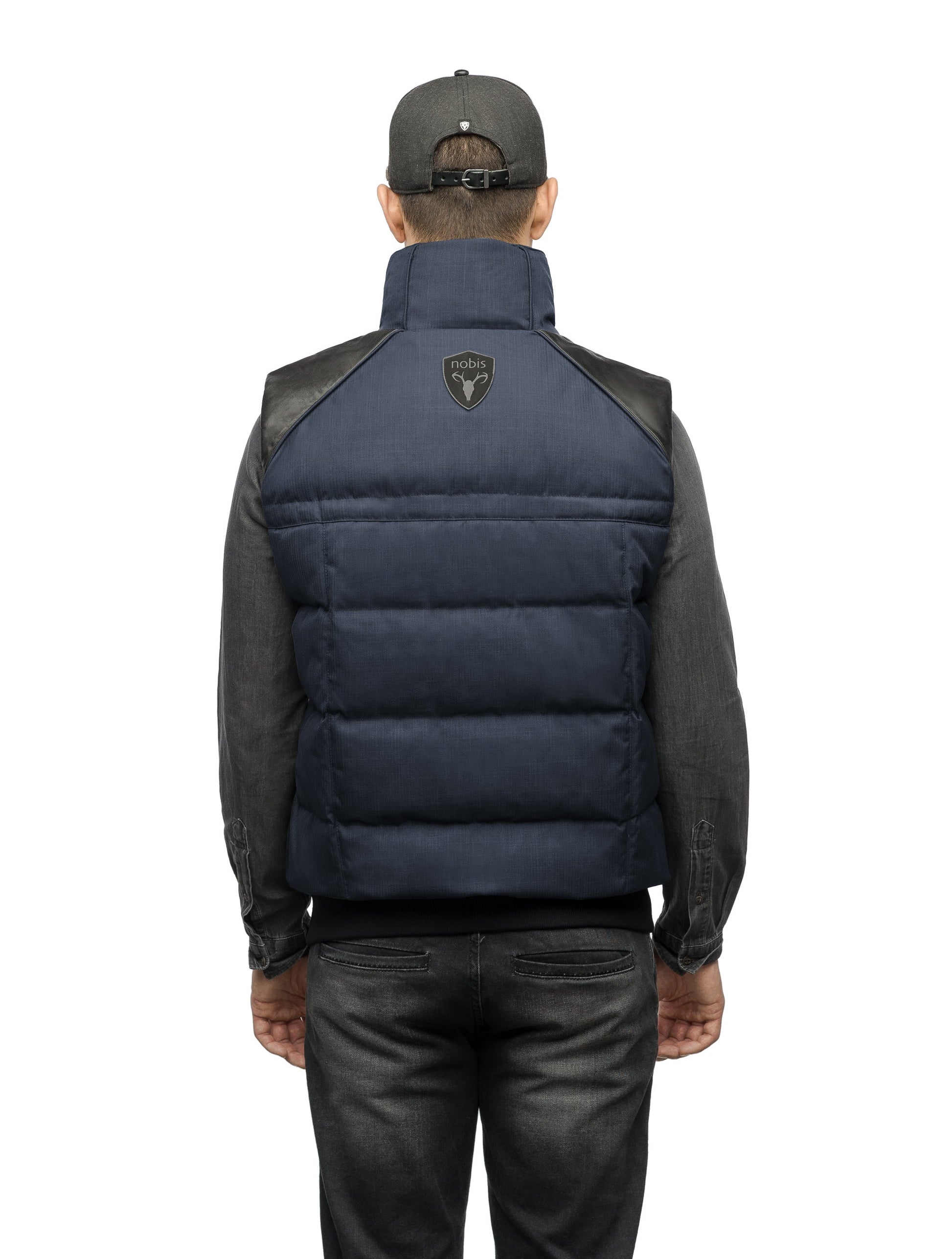 Men's down filled vest with Washable Japanese DWR leather acccent in CH Navy