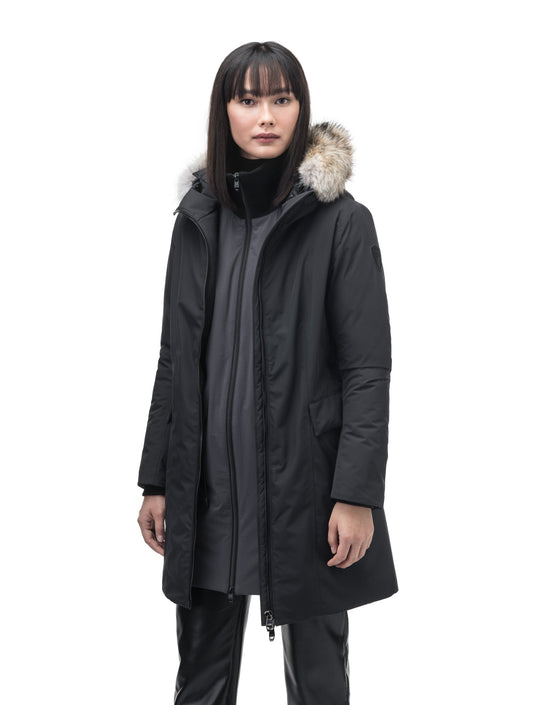 Romeda Ladies Mid Thigh Parka in thigh length, Canadian duck down insulation, non-removable hood with removable fur ruff trim, and two-way front zipper, in Black + Black