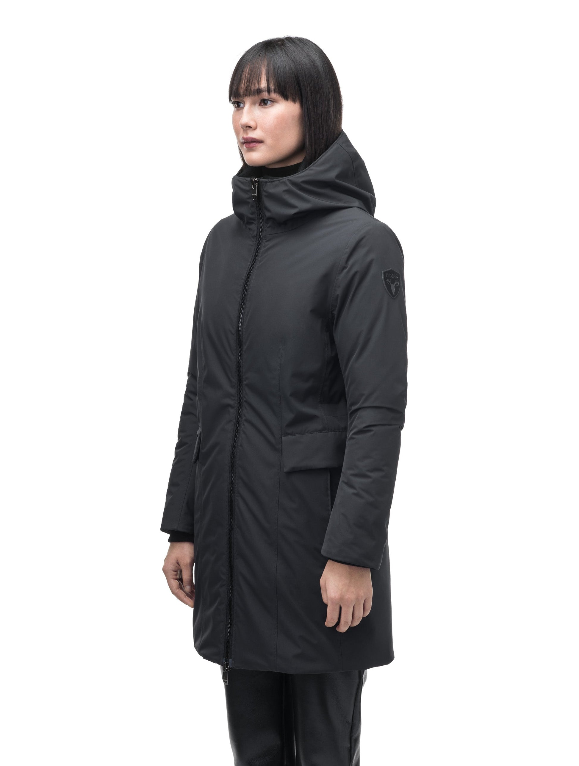 Romeda Ladies Mid Thigh Parka in thigh length, Canadian duck down insulation, non-removable hood with removable fur ruff trim, and two-way front zipper, in Black