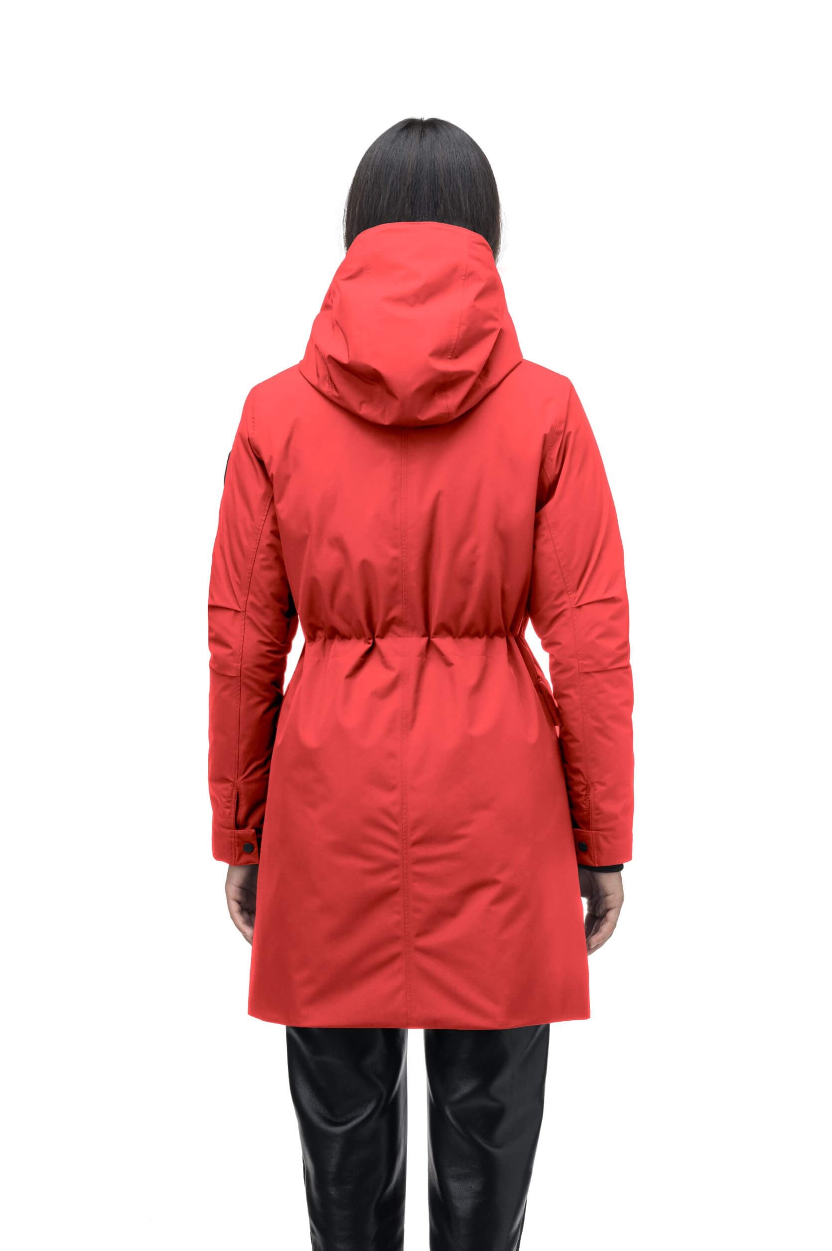 Romeda Ladies Mid Thigh Parka in thigh length, Canadian duck down insulation, non-removable hood with removable fur ruff trim, and two-way front zipper, in Vermillion