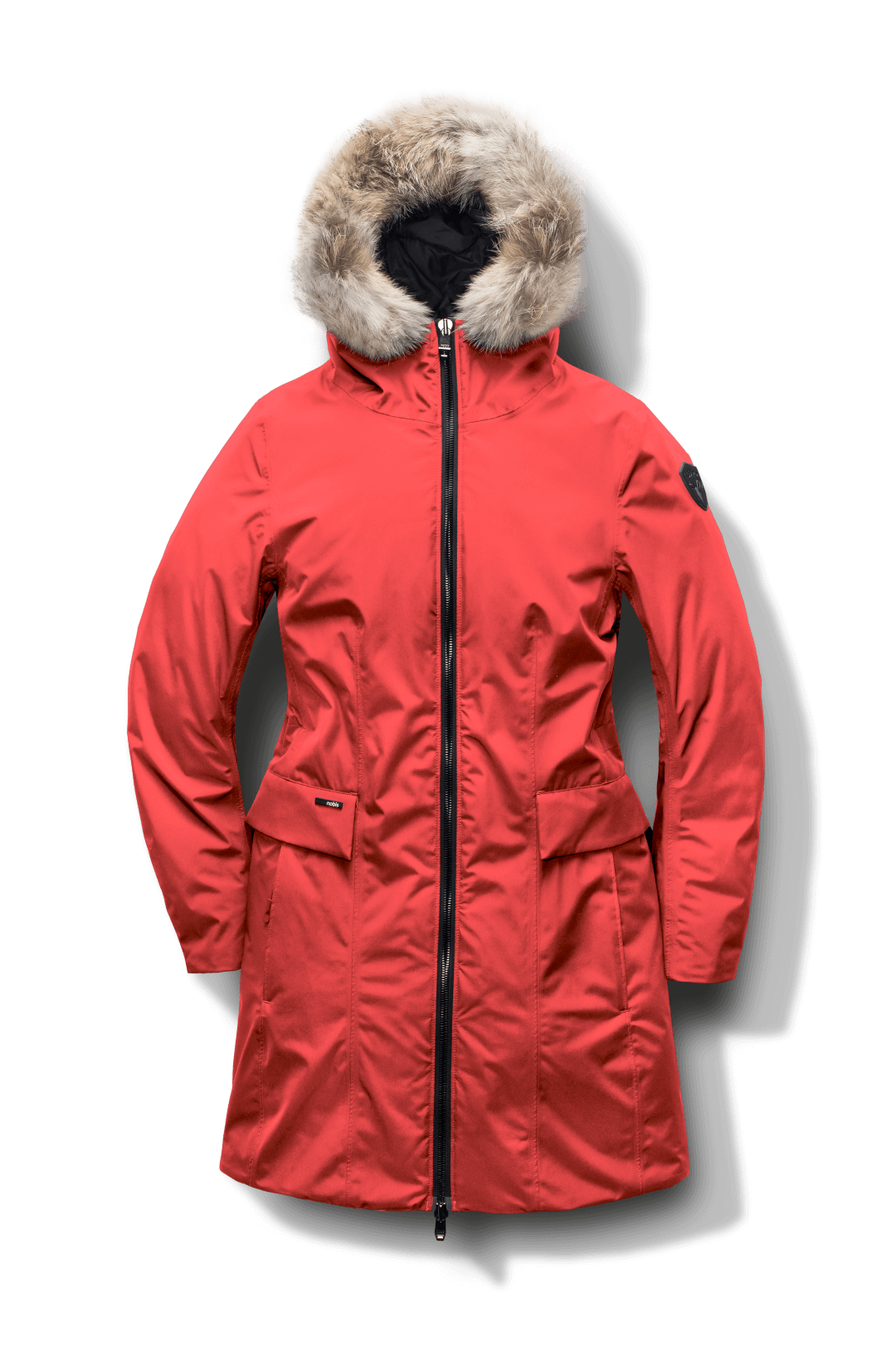 Romeda Ladies Mid Thigh Parka in thigh length, Canadian duck down insulation, non-removable hood with removable fur ruff trim, and two-way front zipper, in Vermillion