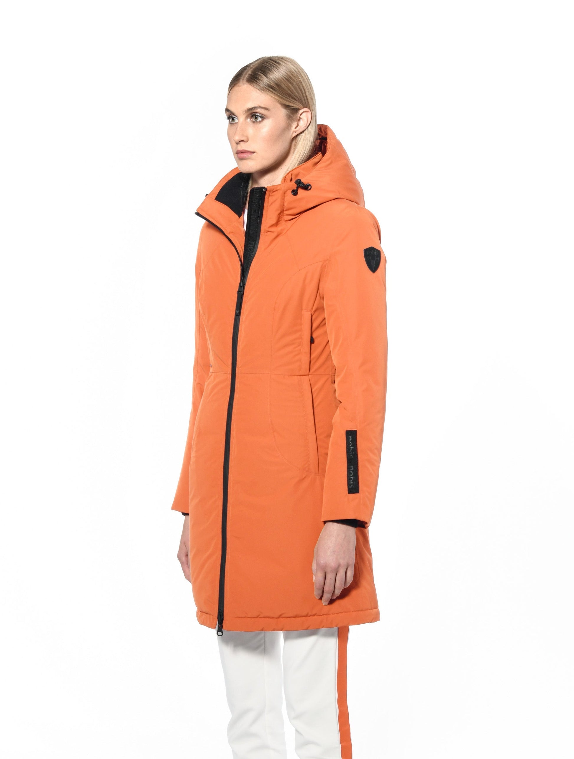 Ladies thigh length down-filled parka with non-removable hood and removable coyote fur trim in Atomic