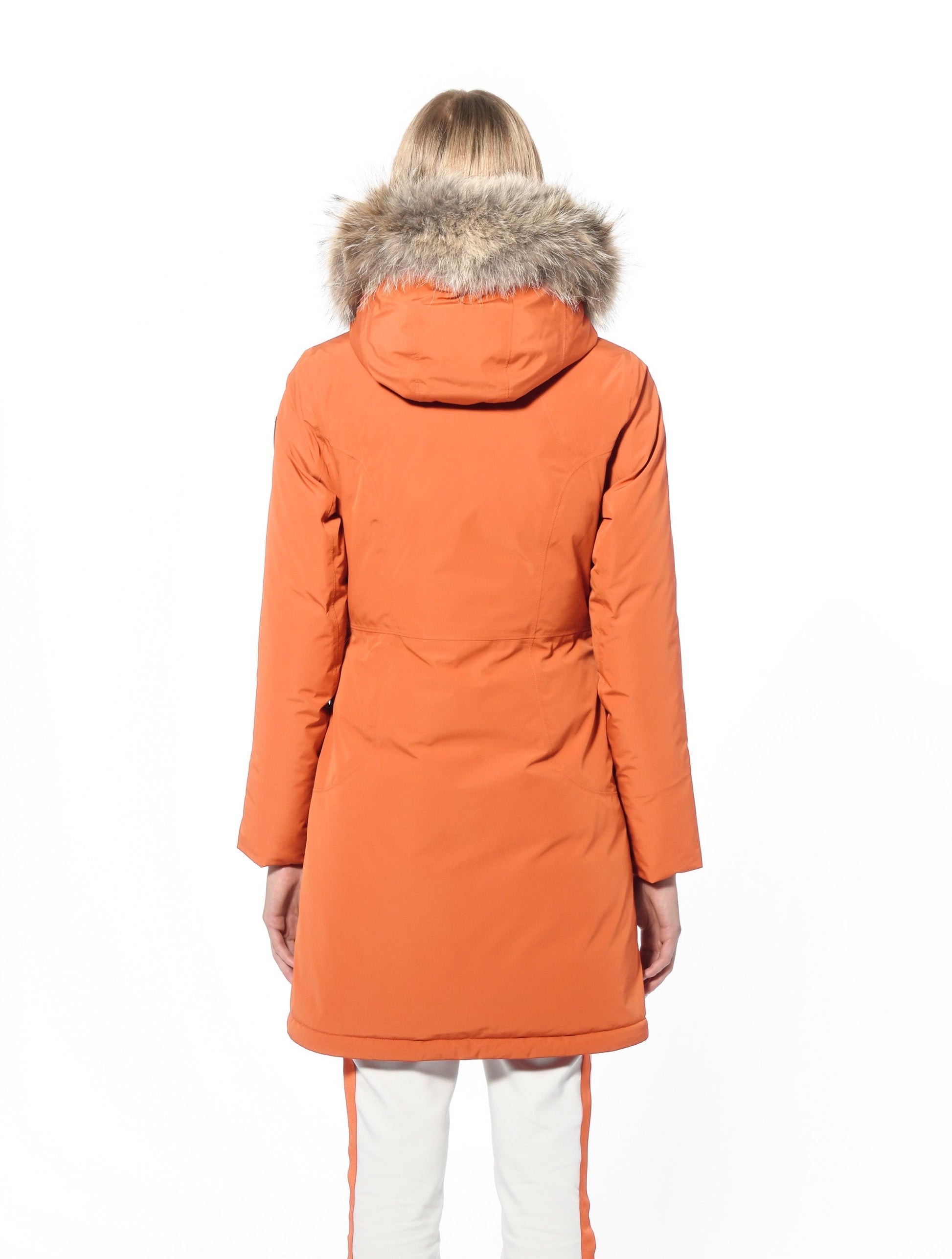 Ladies thigh length down-filled parka with non-removable hood and removable coyote fur trim in Atomic