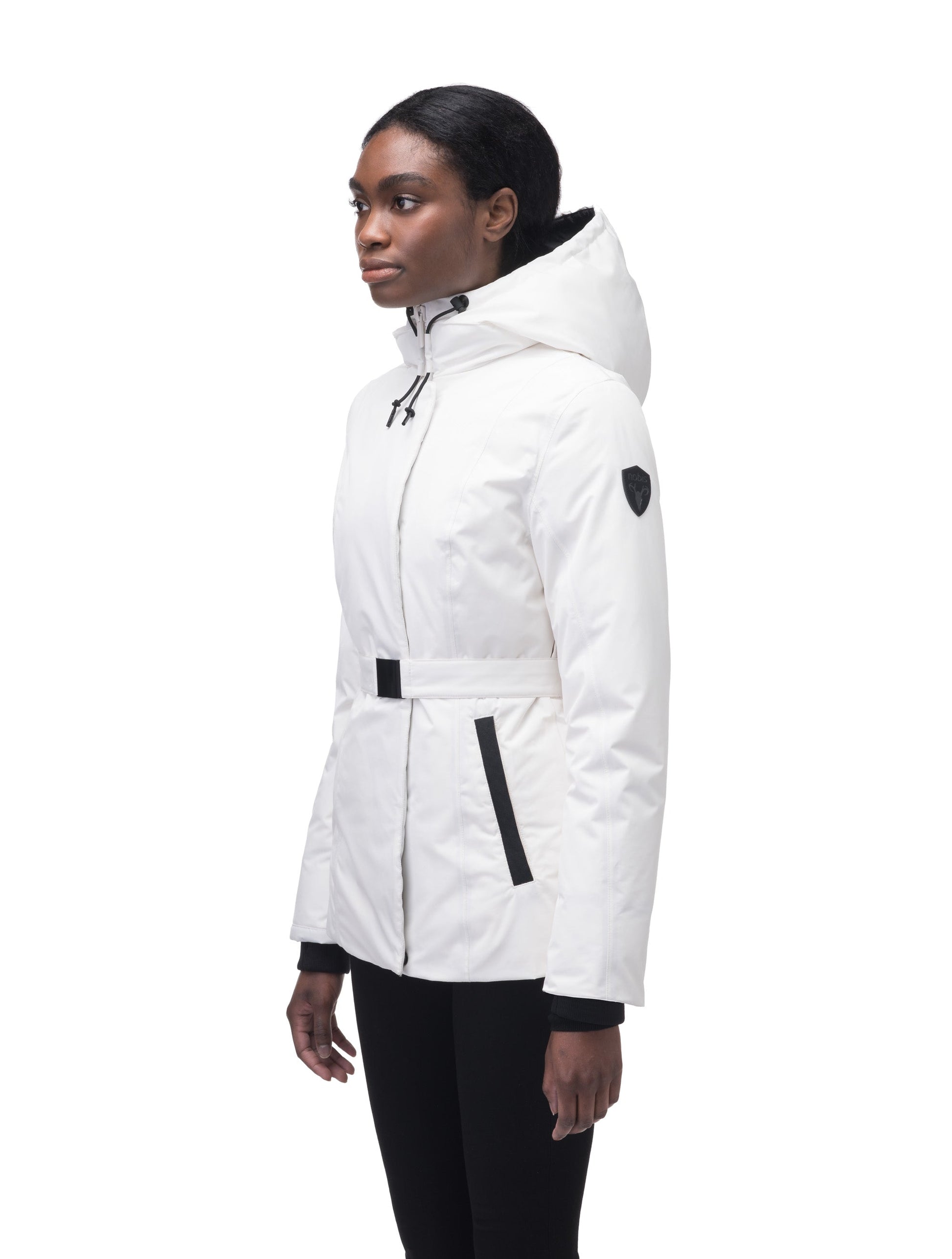 Ladies hip length down-filled parka with non-removable hood and adjustable belt in Chalk