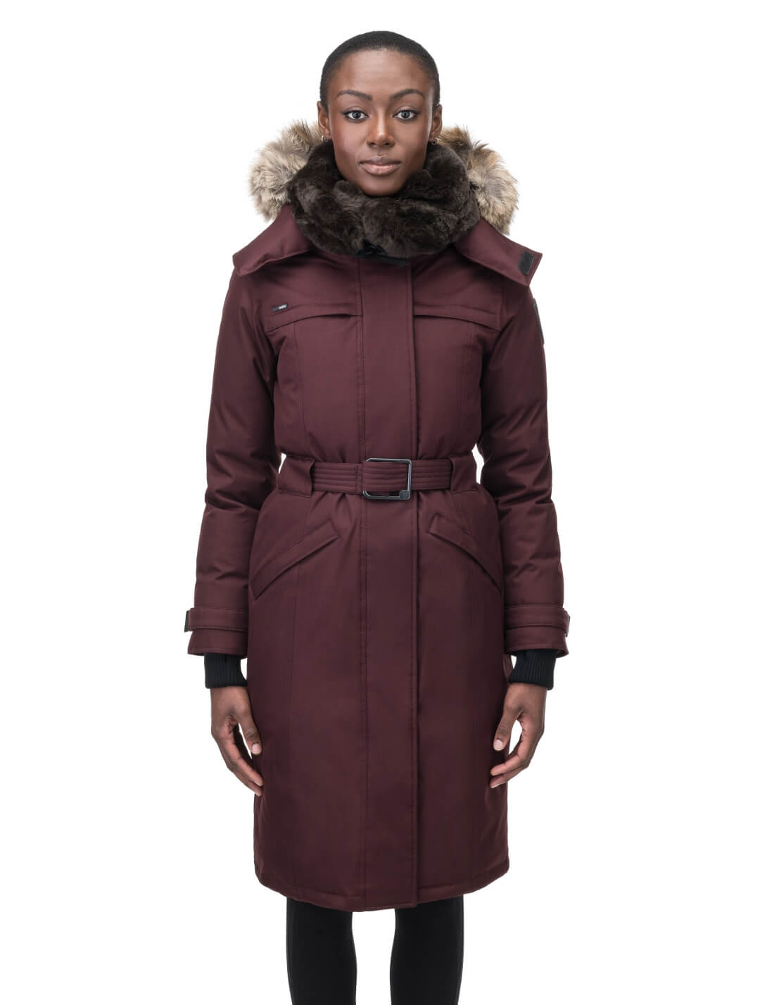 Women's knee length down filled parka with a belted waist and fully removable Coyote and Rex Rabbit fur ruffs in Merlot