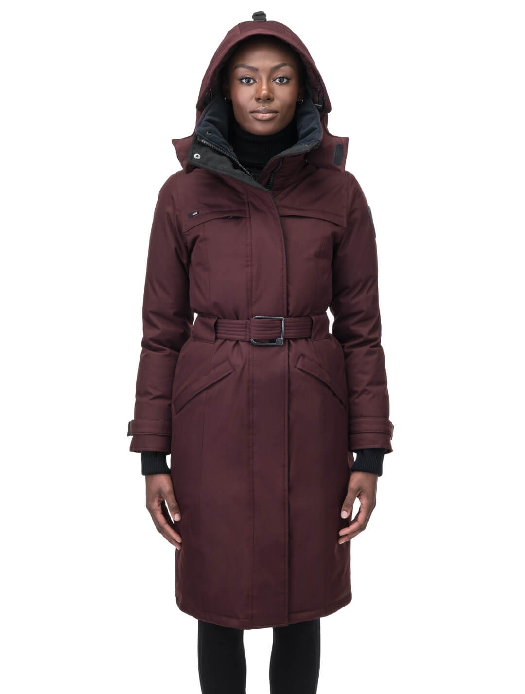 Women's knee length down filled parka with a belted waist and fully removable Coyote and Rex Rabbit fur ruffs in Merlot