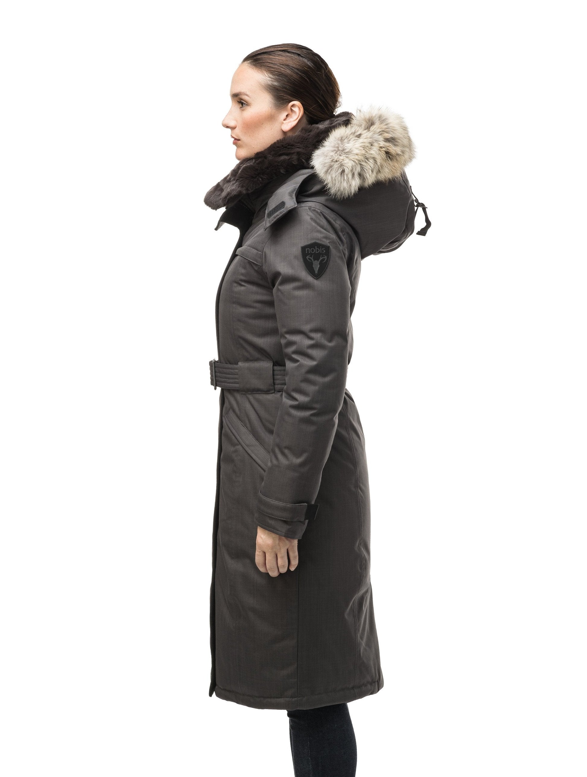 Women's knee length down filled parka with a belted waist and fully removable Coyote and Rex Rabbit fur ruffs in CH Steel Grey