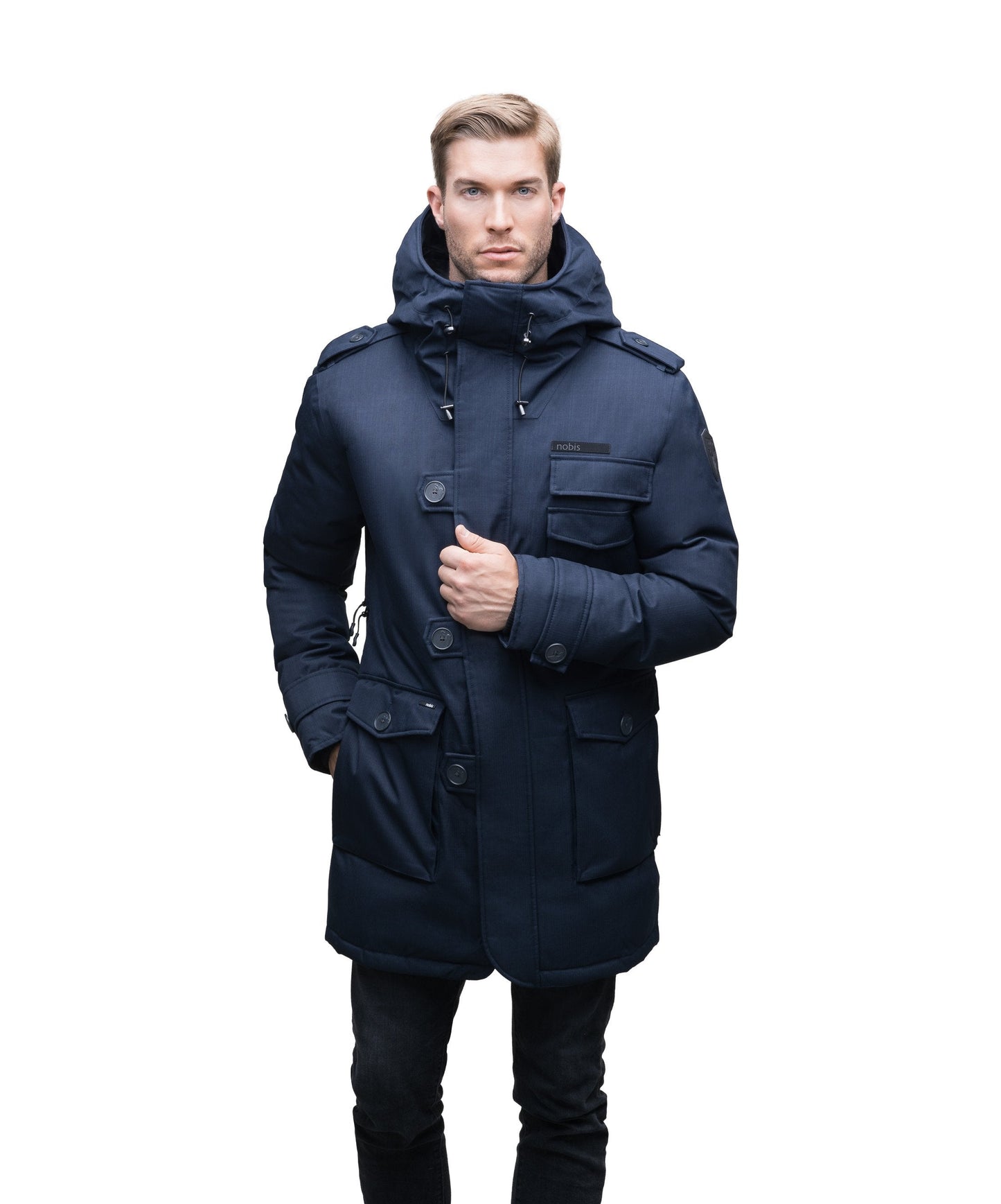 Men's down filled parka with faux button magnet closures and fur free hood with a fishtail hemline in CH Navy