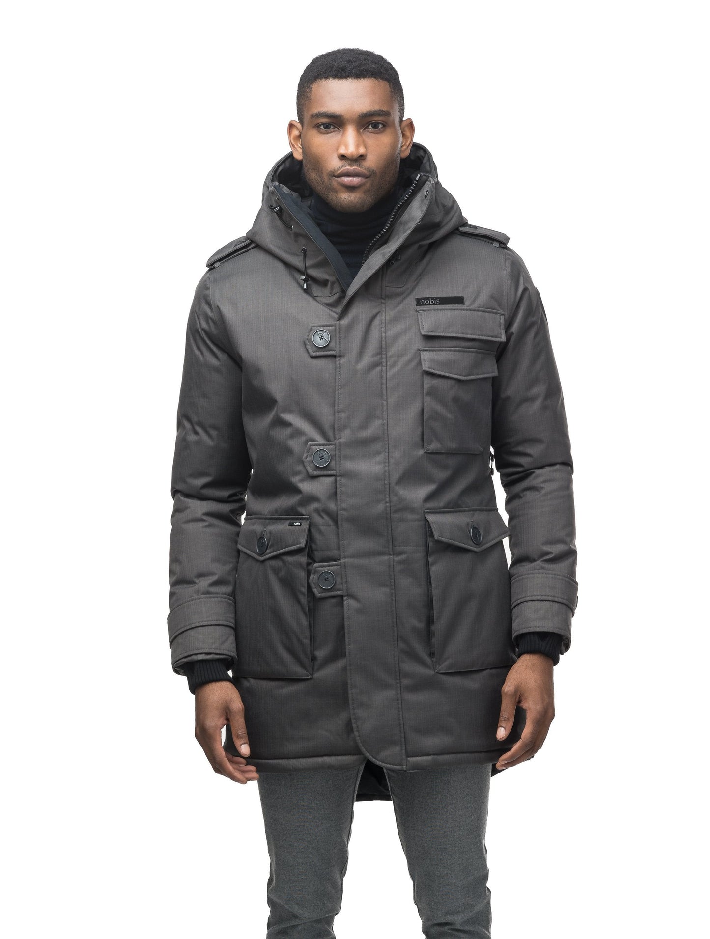 Men's down filled parka with faux button magnet closures and fur free hood with a fishtail hemline in Steel Grey